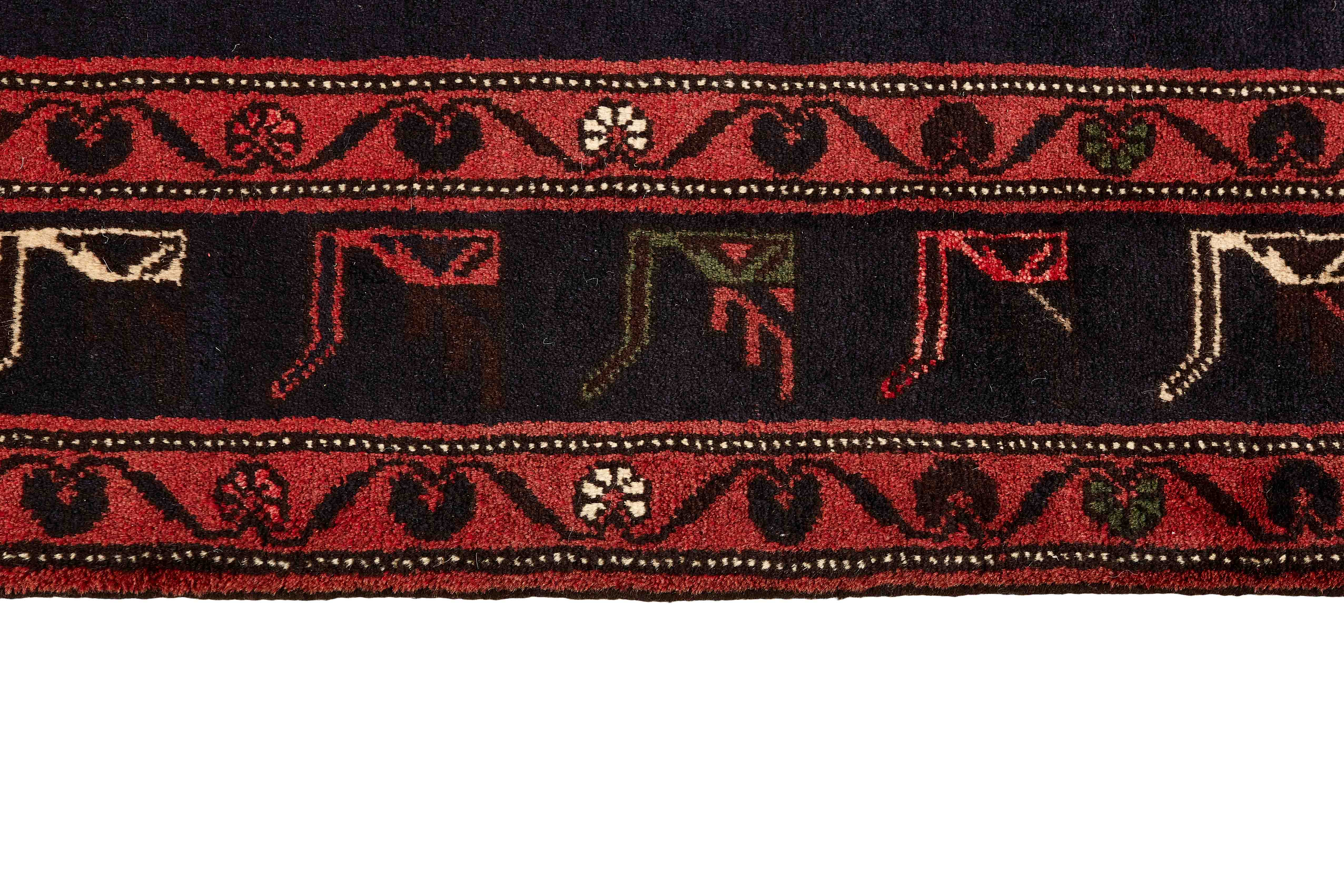 Authentic persian rug with a traditional geometric pattern in red