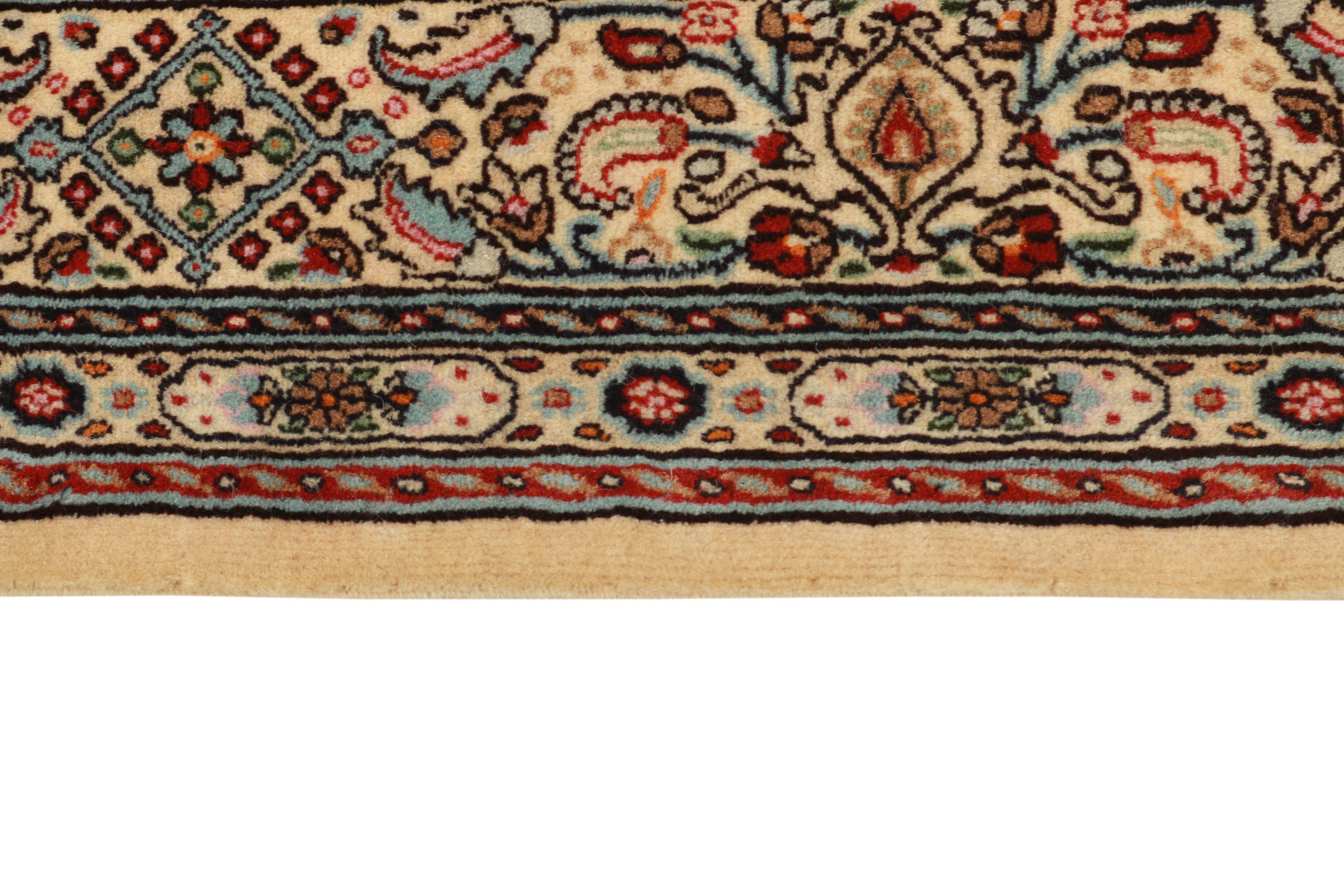 authentic persian rug with traditional floral pattern in cream