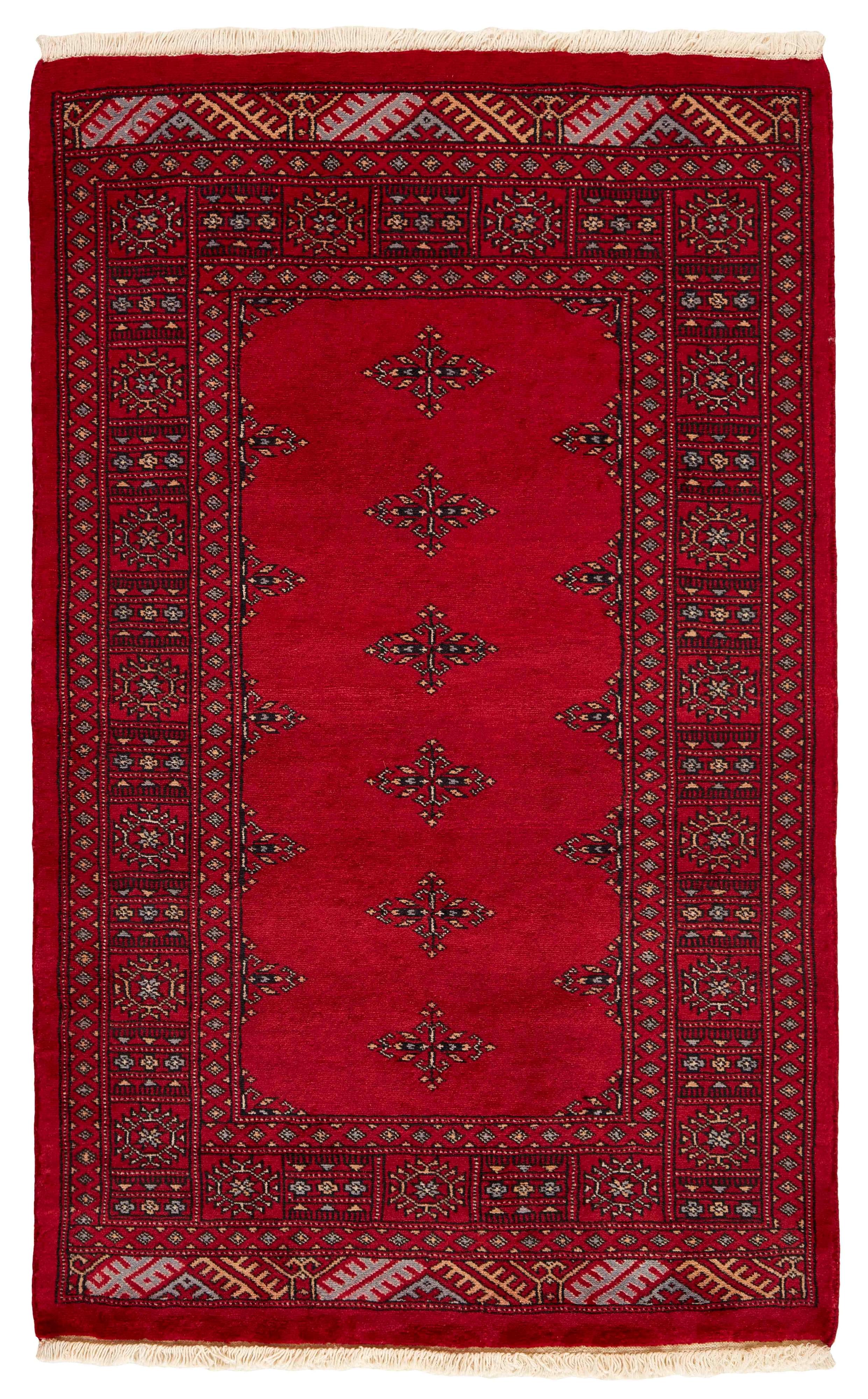 red oriental rug with traditional pattern