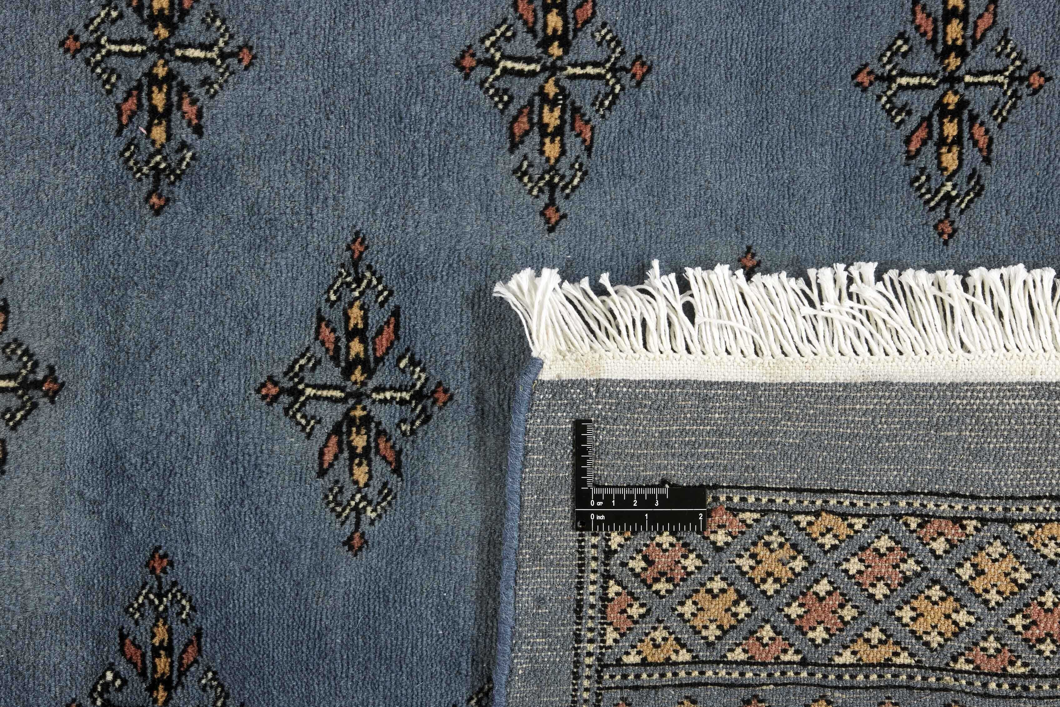 blue oriental rug with traditional pattern