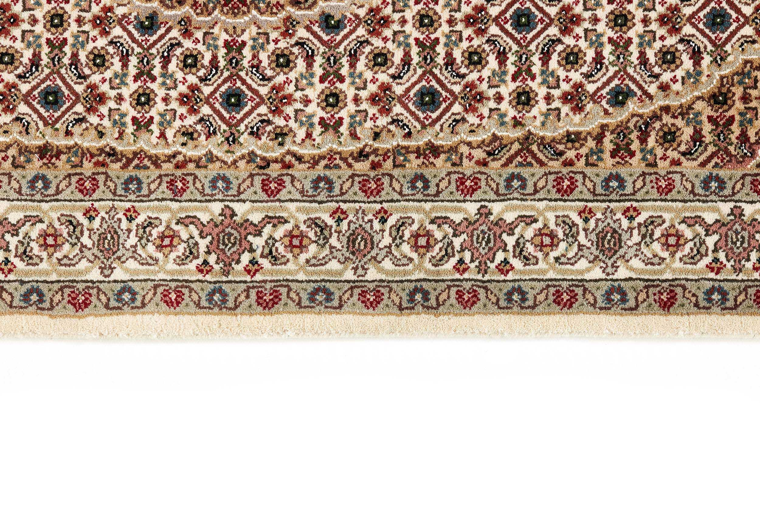 Authentic Oriental rug with traditional geometric and floral design in red