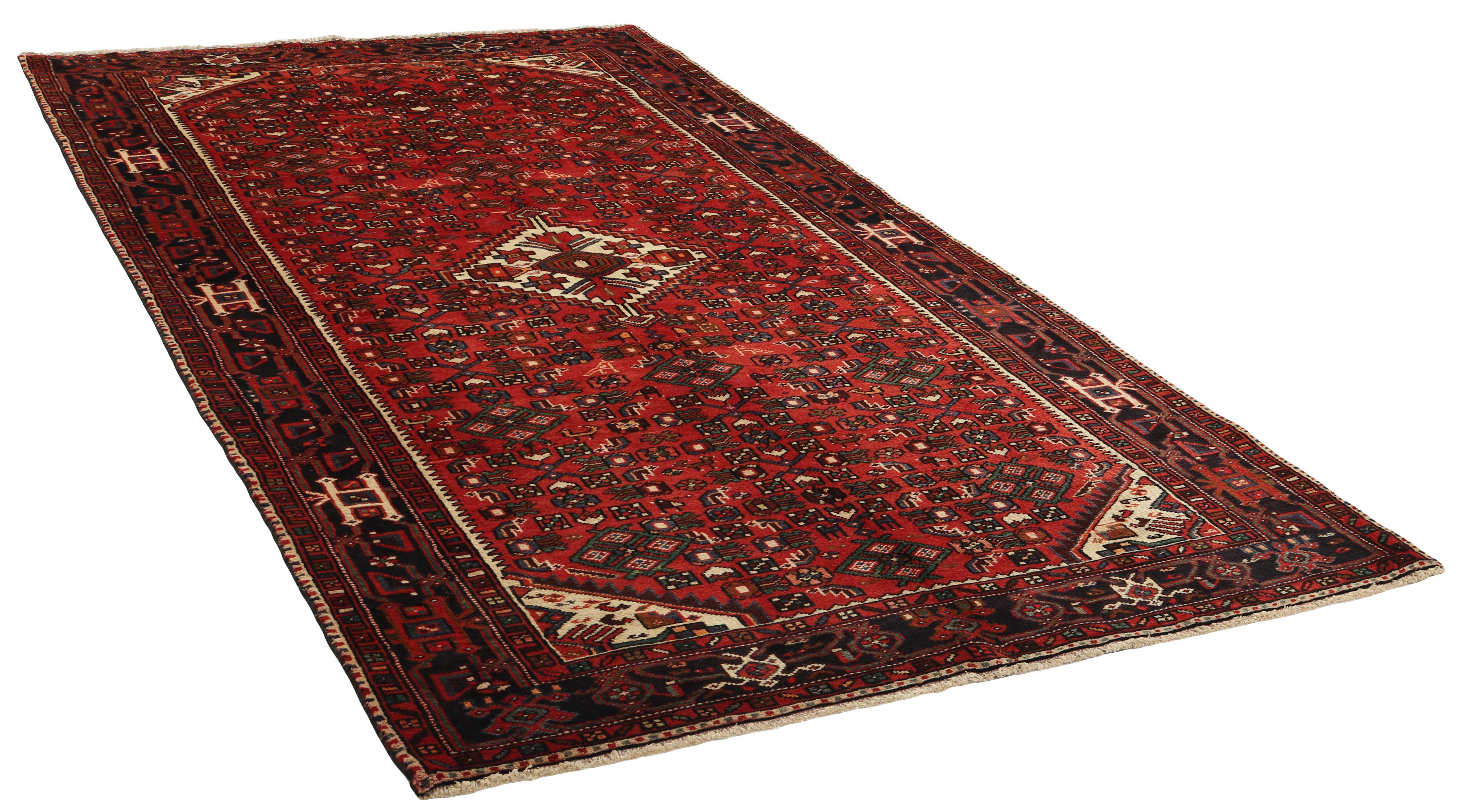 Authentic persian rug with traditional geometric tribal design in red