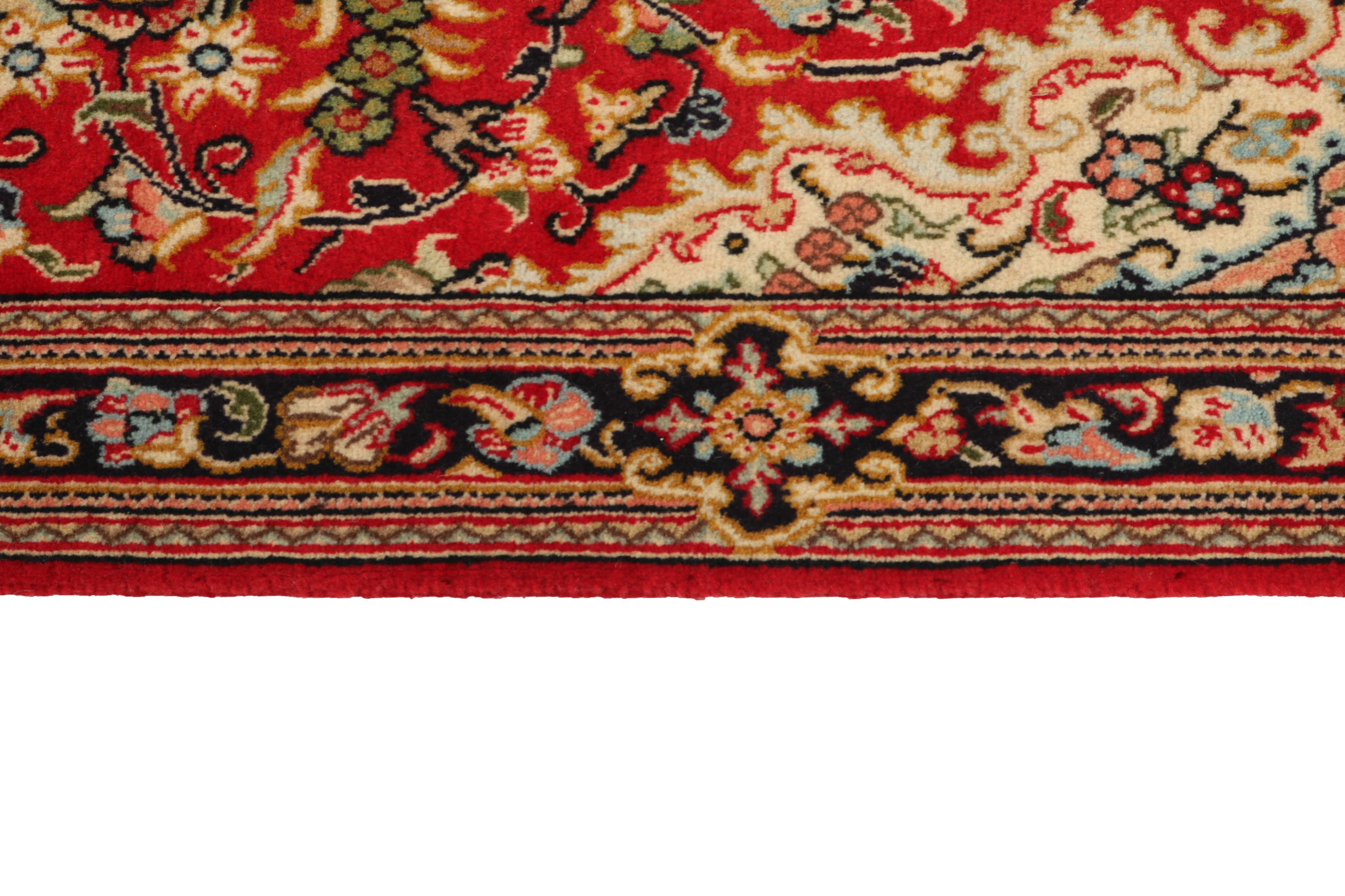 Authentic persian runner with a traditional floral design in red and beige