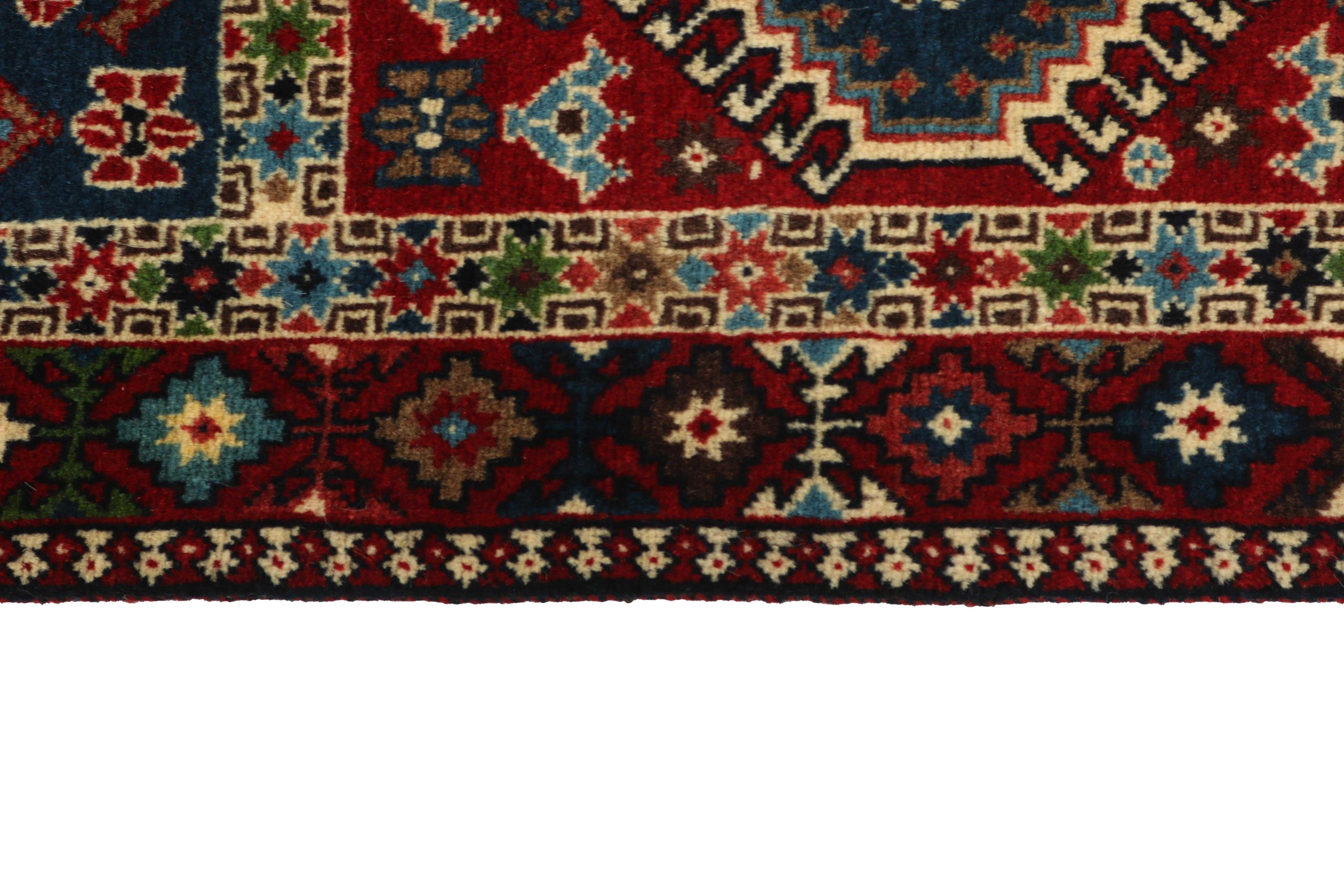 red authentic persian rug with a traditional design