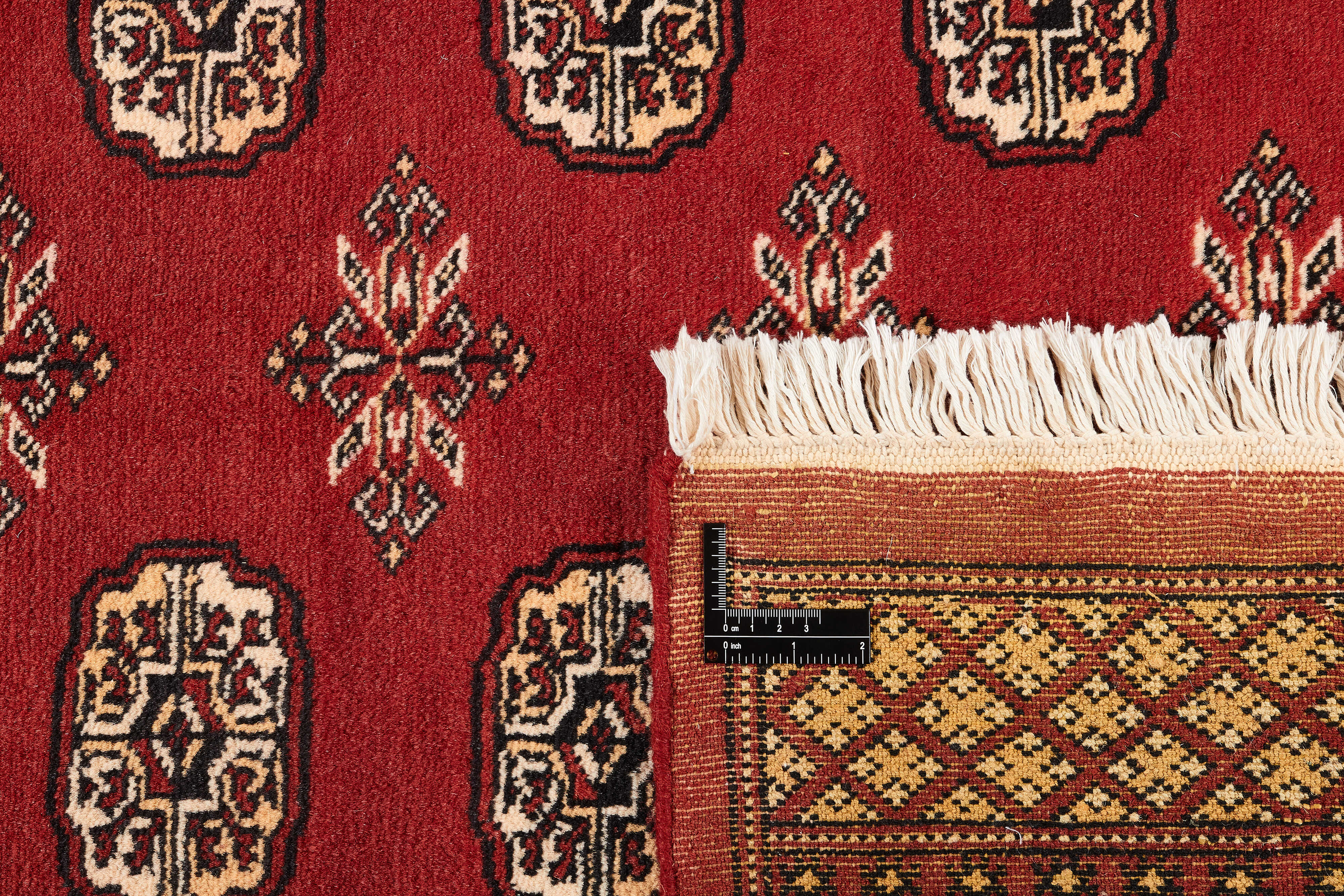 red oriental rug with traditional pattern