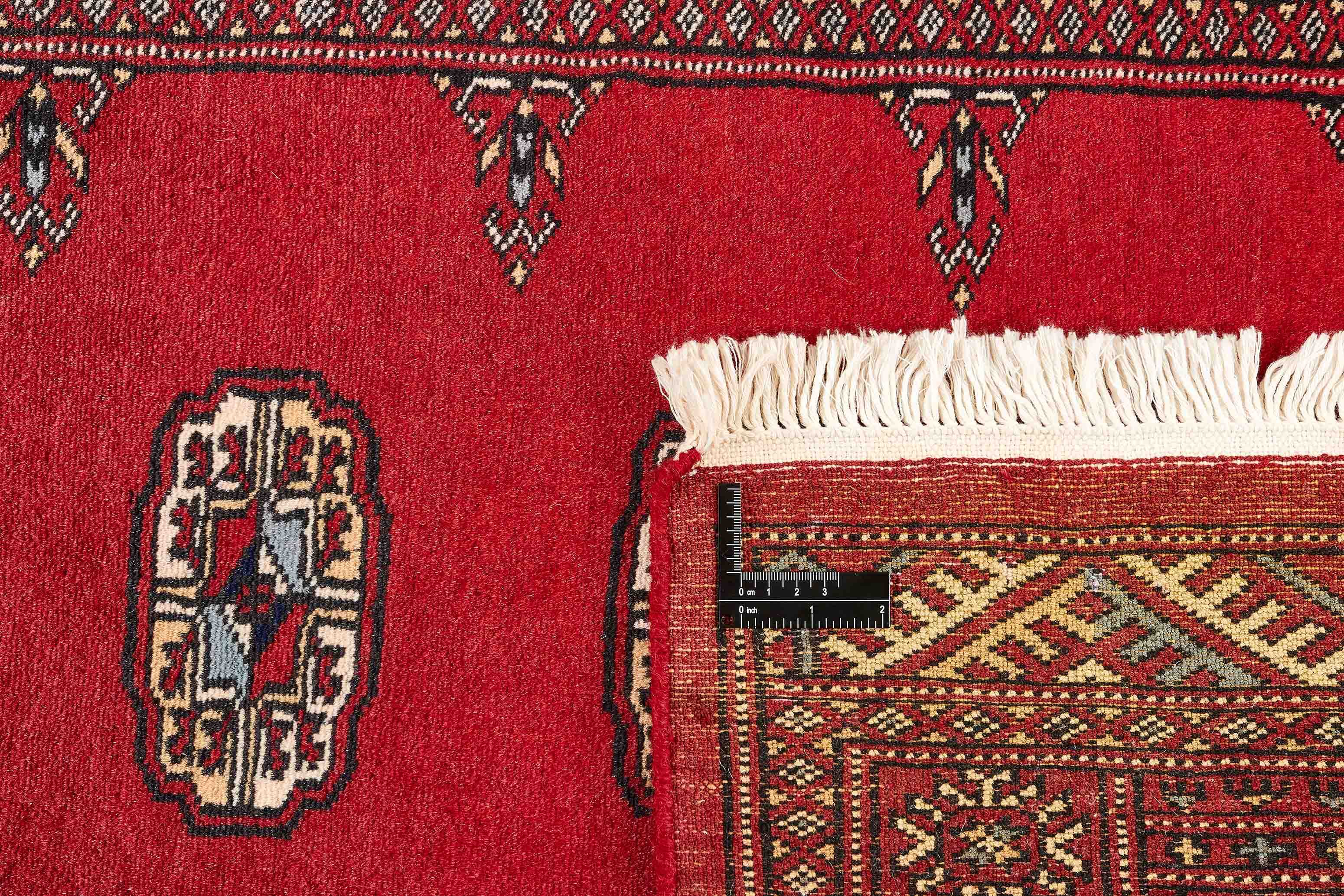 black oriental runner with traditional gul pattern