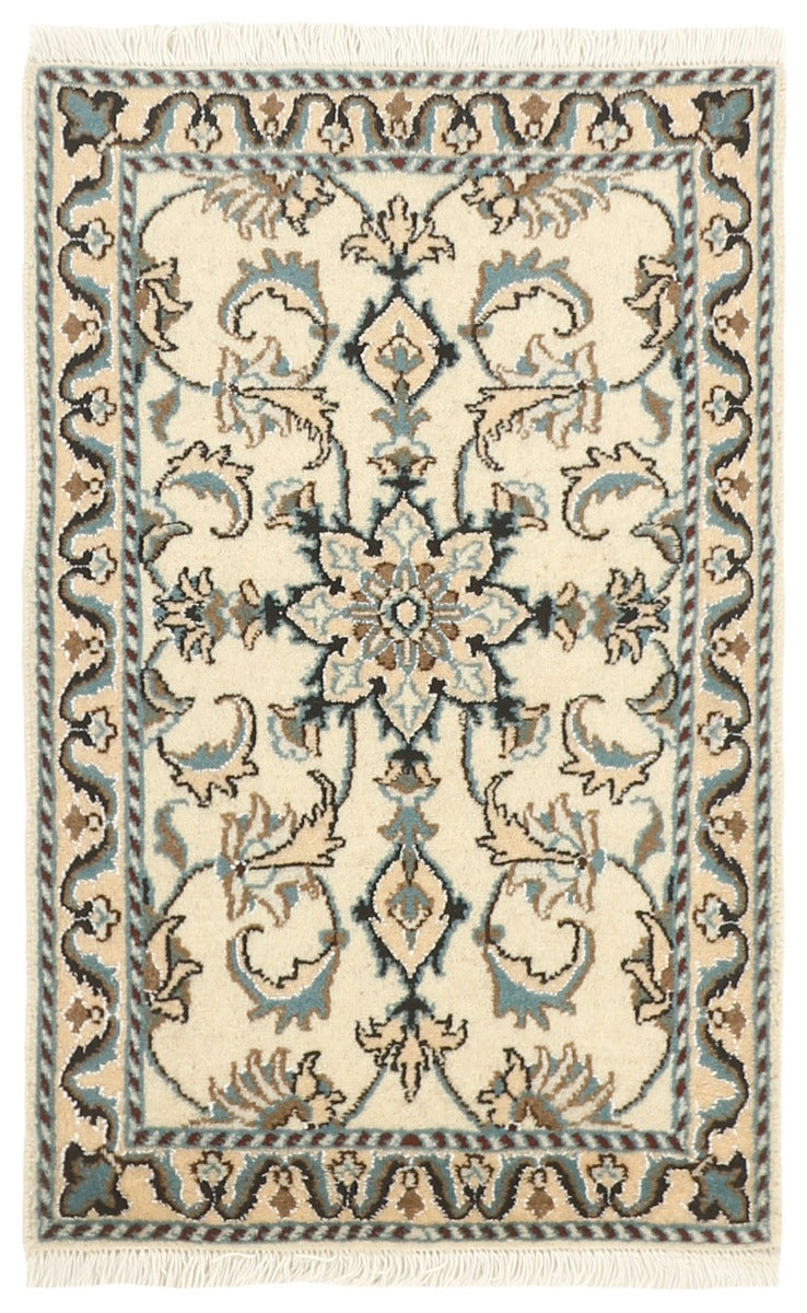 authentic persian rug with a traditional floral design in cream and blue
