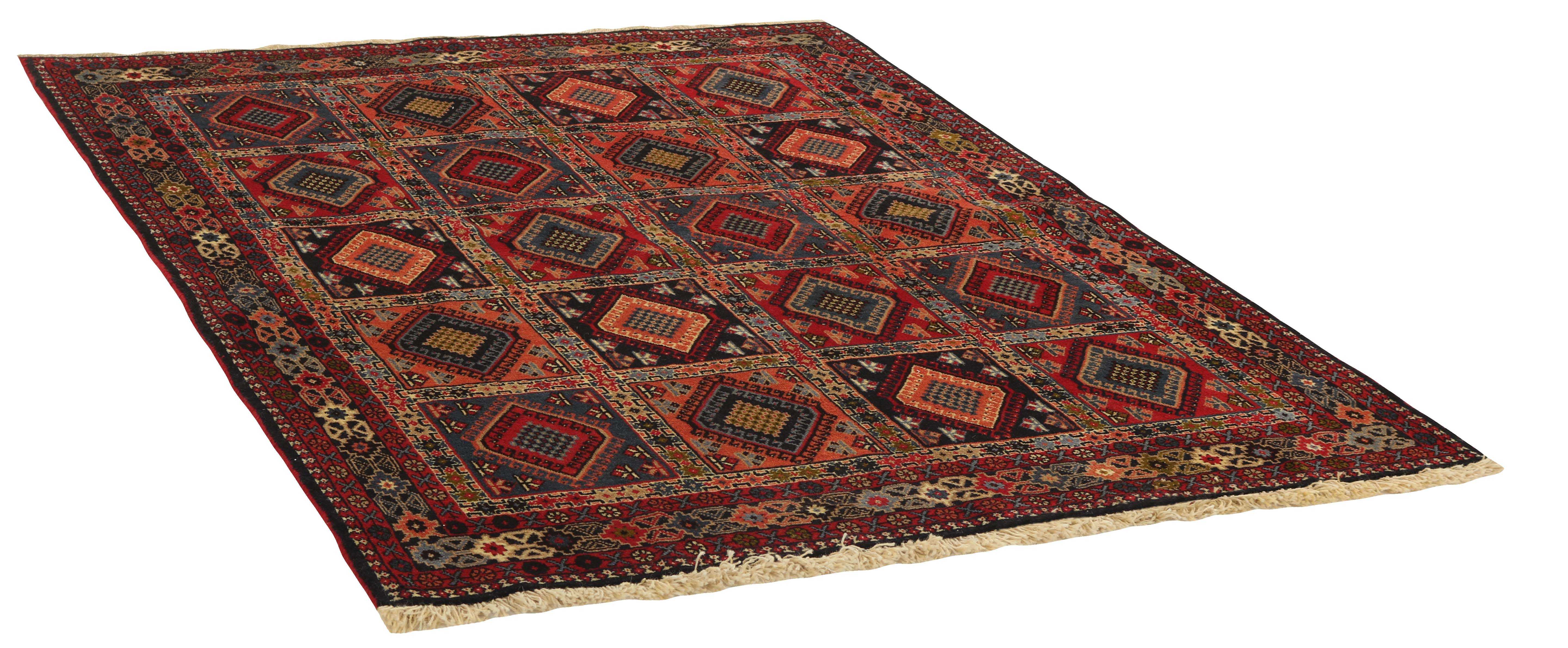 red authentic persian rug with a traditional design