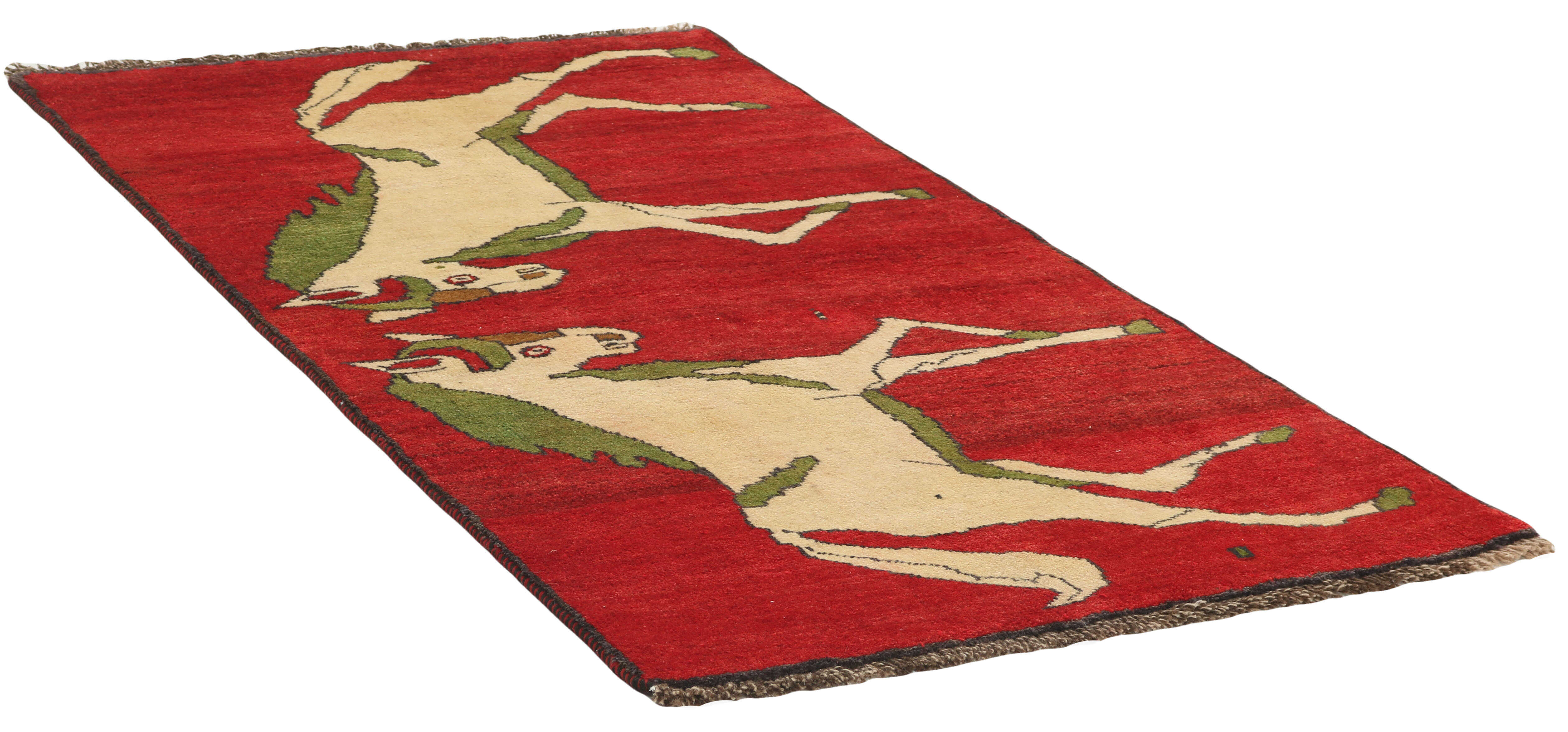 red persian rug with figural design