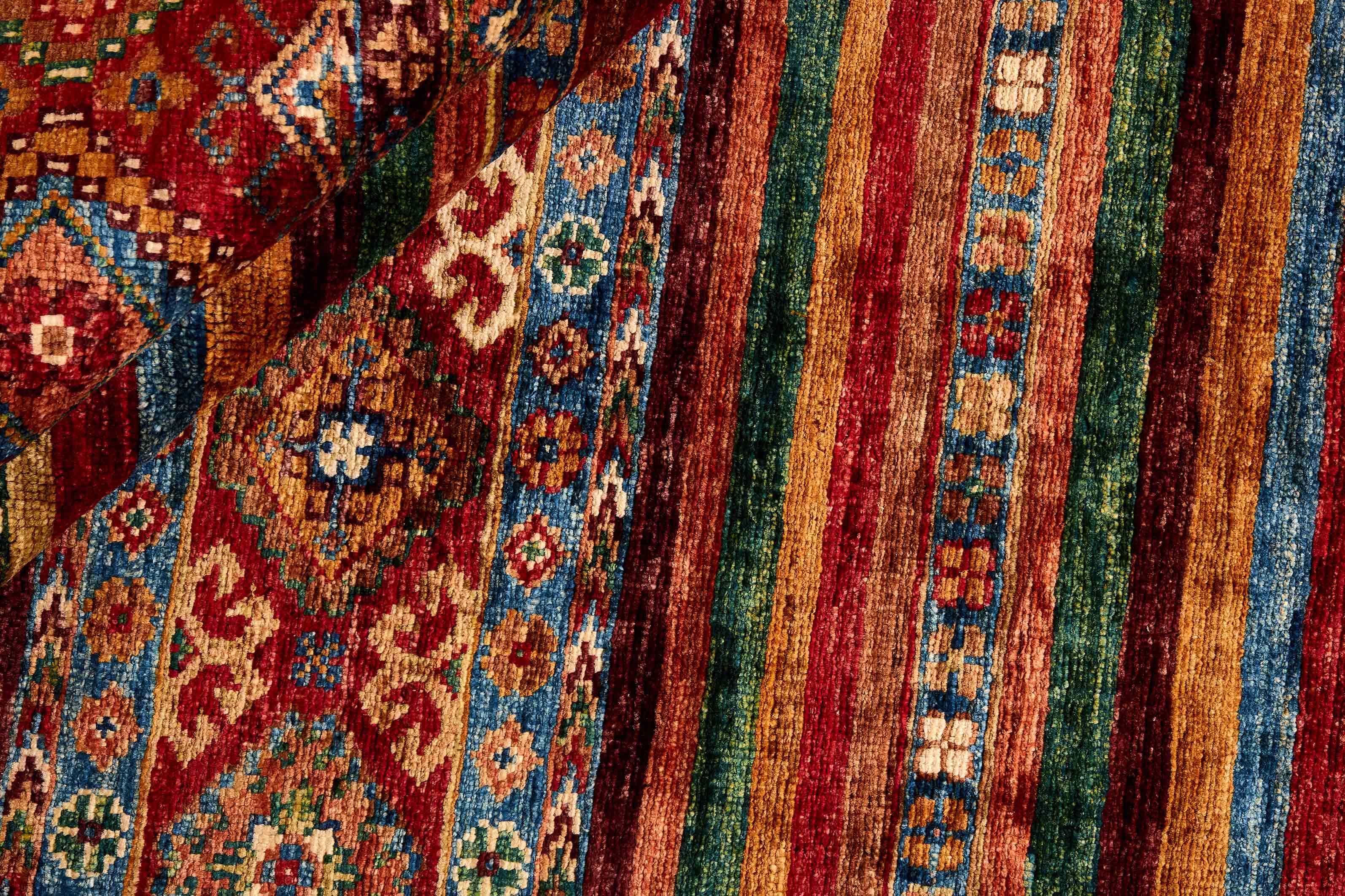 Authentic oriental rug with traditional tile pattern in multicolour