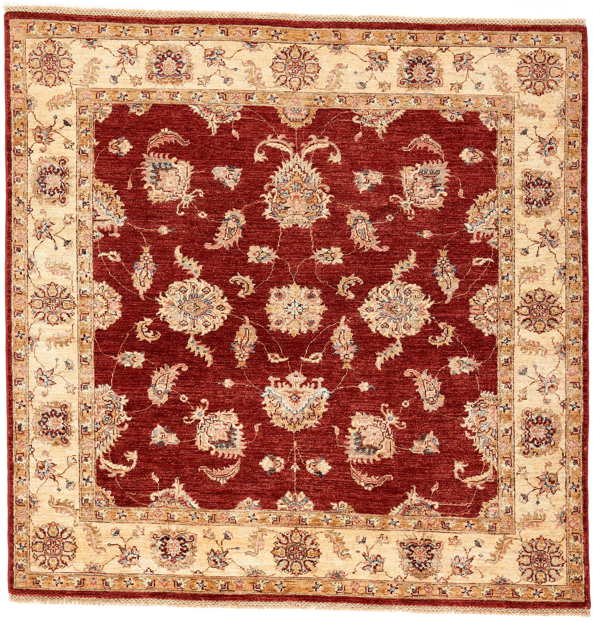 square oriental rug with red and beige floral pattern