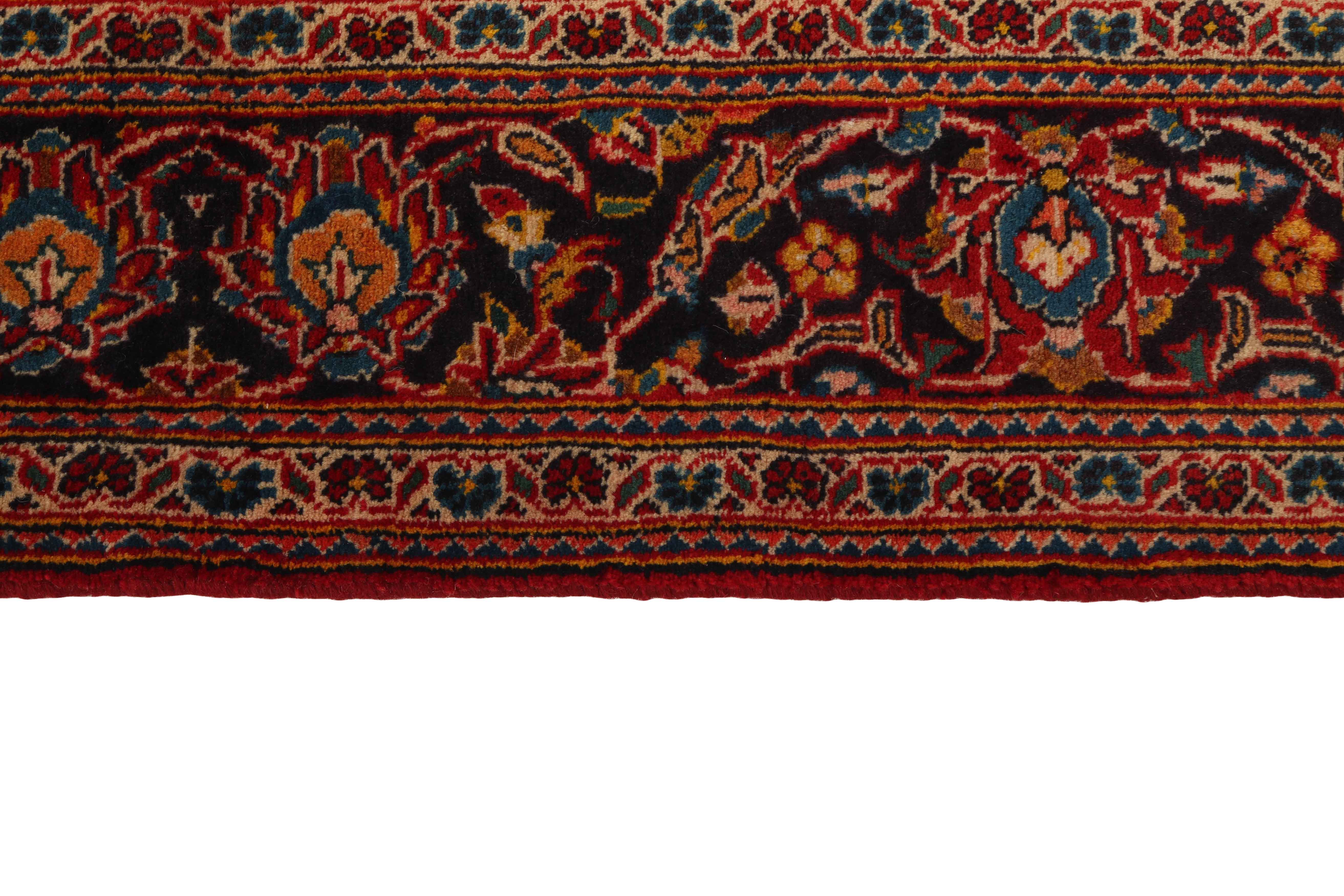 Authentic persian rug with traditional floral design in red and blue