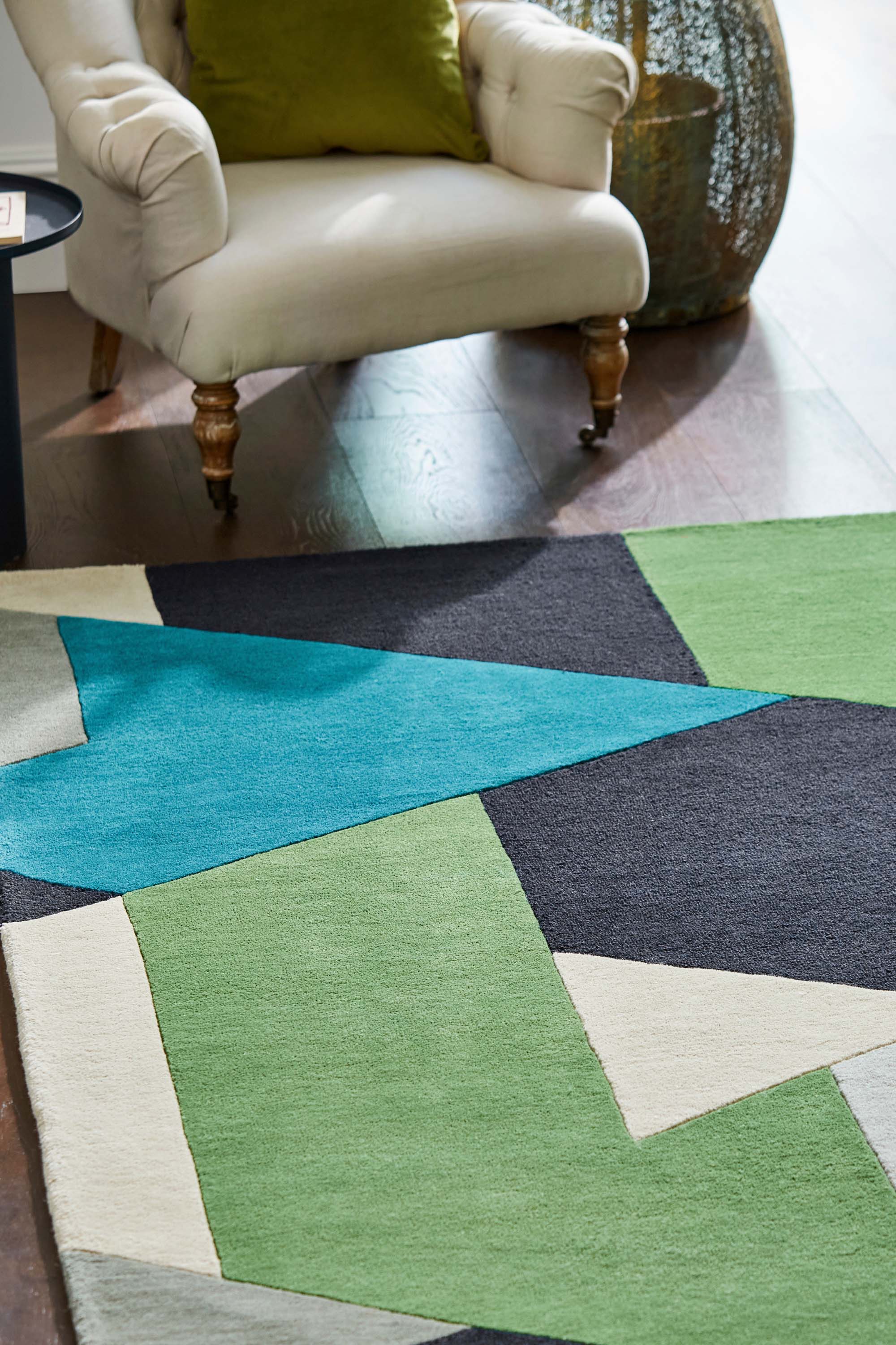 abstract wool rug in green, blue and grey