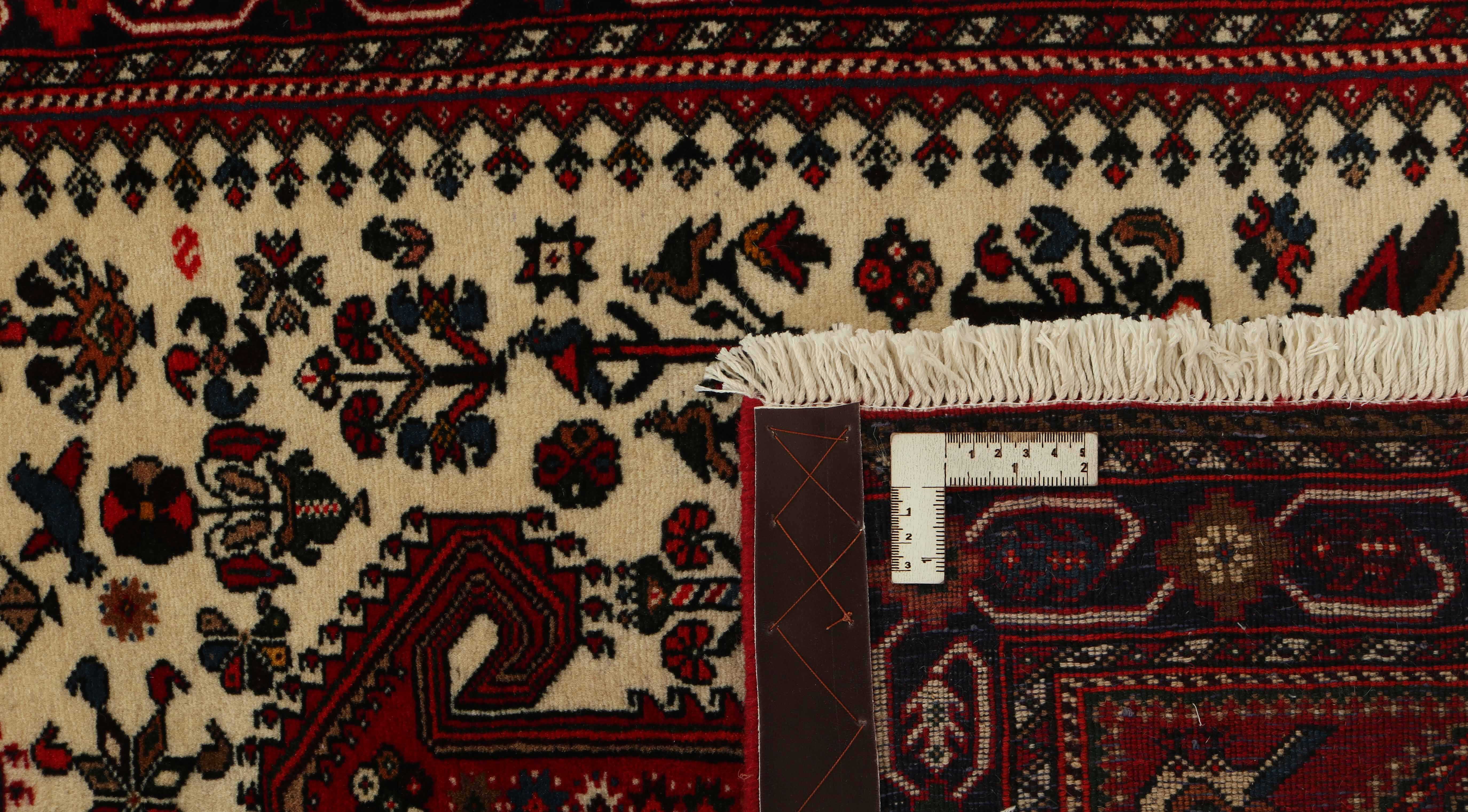 Authentic persian runner with traditional tribal geometric design in red