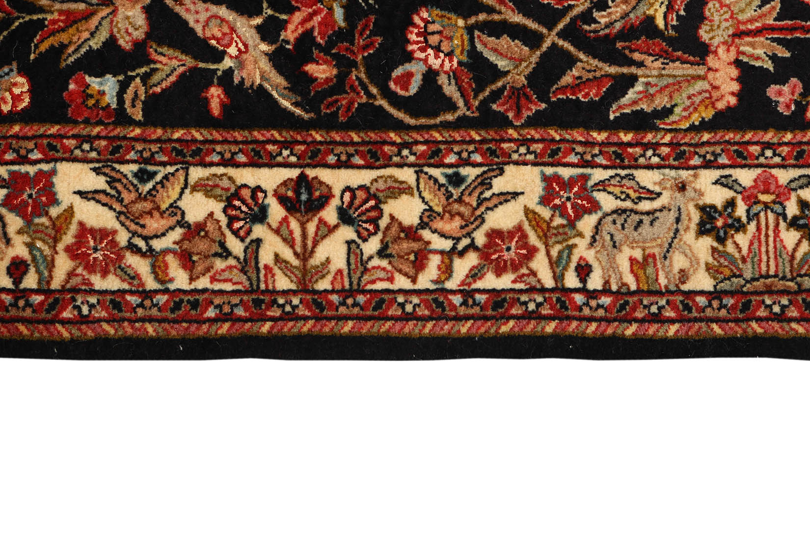 Red and cream persian wool and silk runner with traditional floral and fauna design

