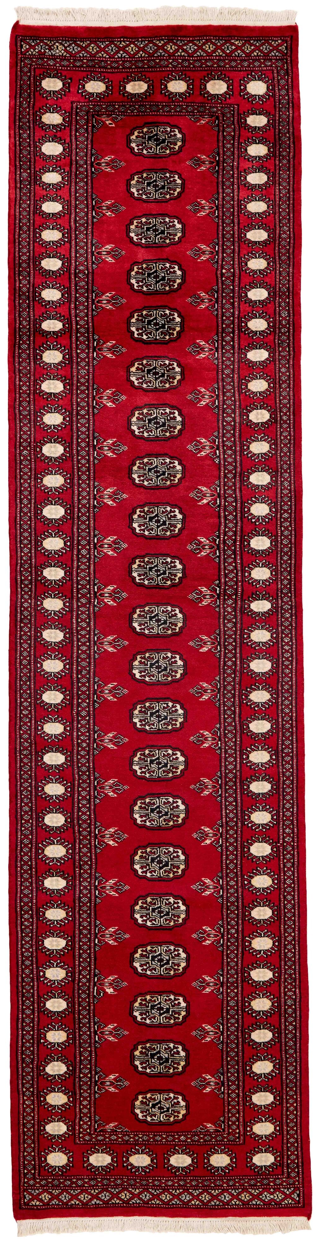 Red Oriental runner with traditional bordered pattern