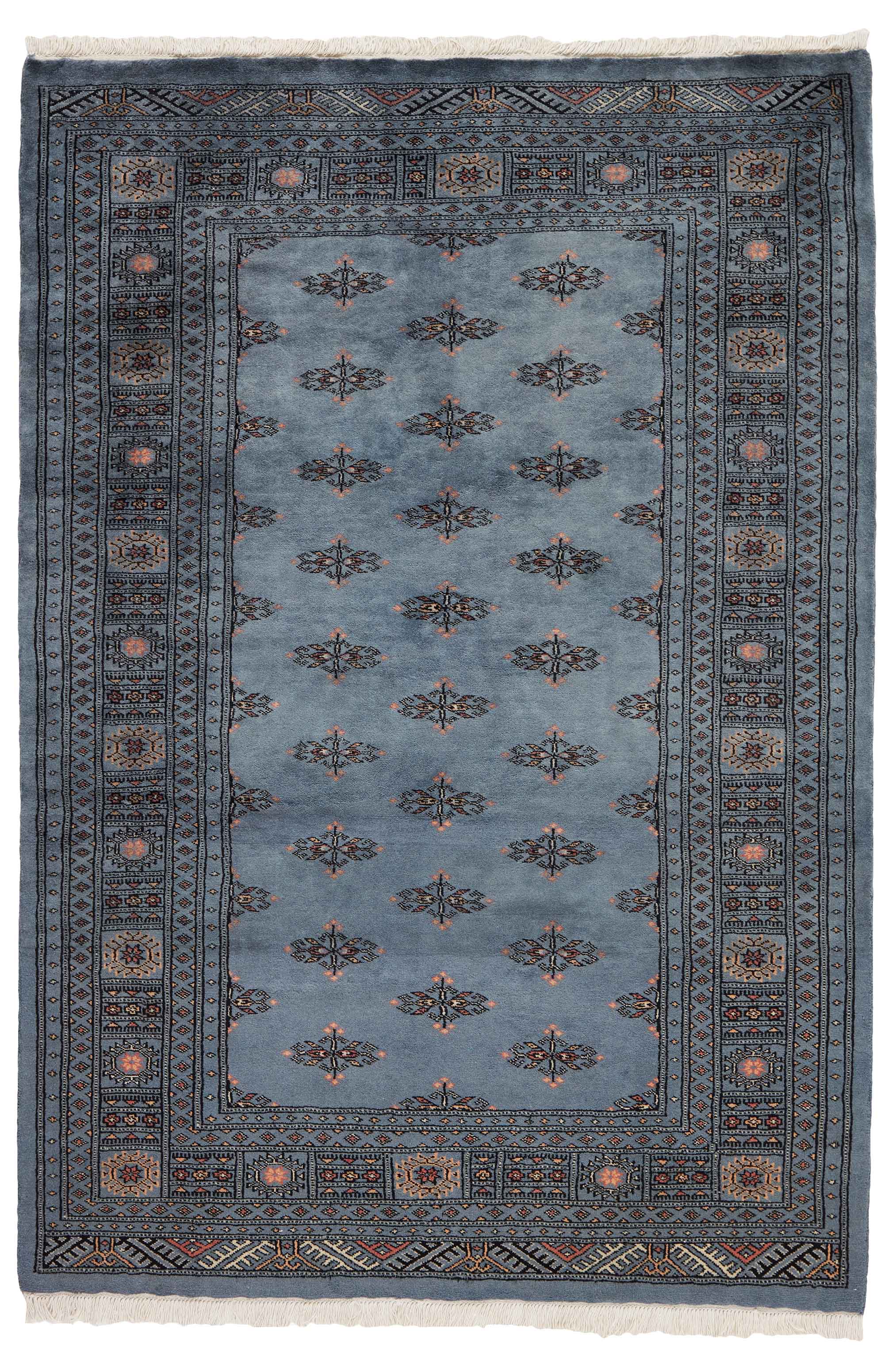 blue oriental rug with traditional pattern