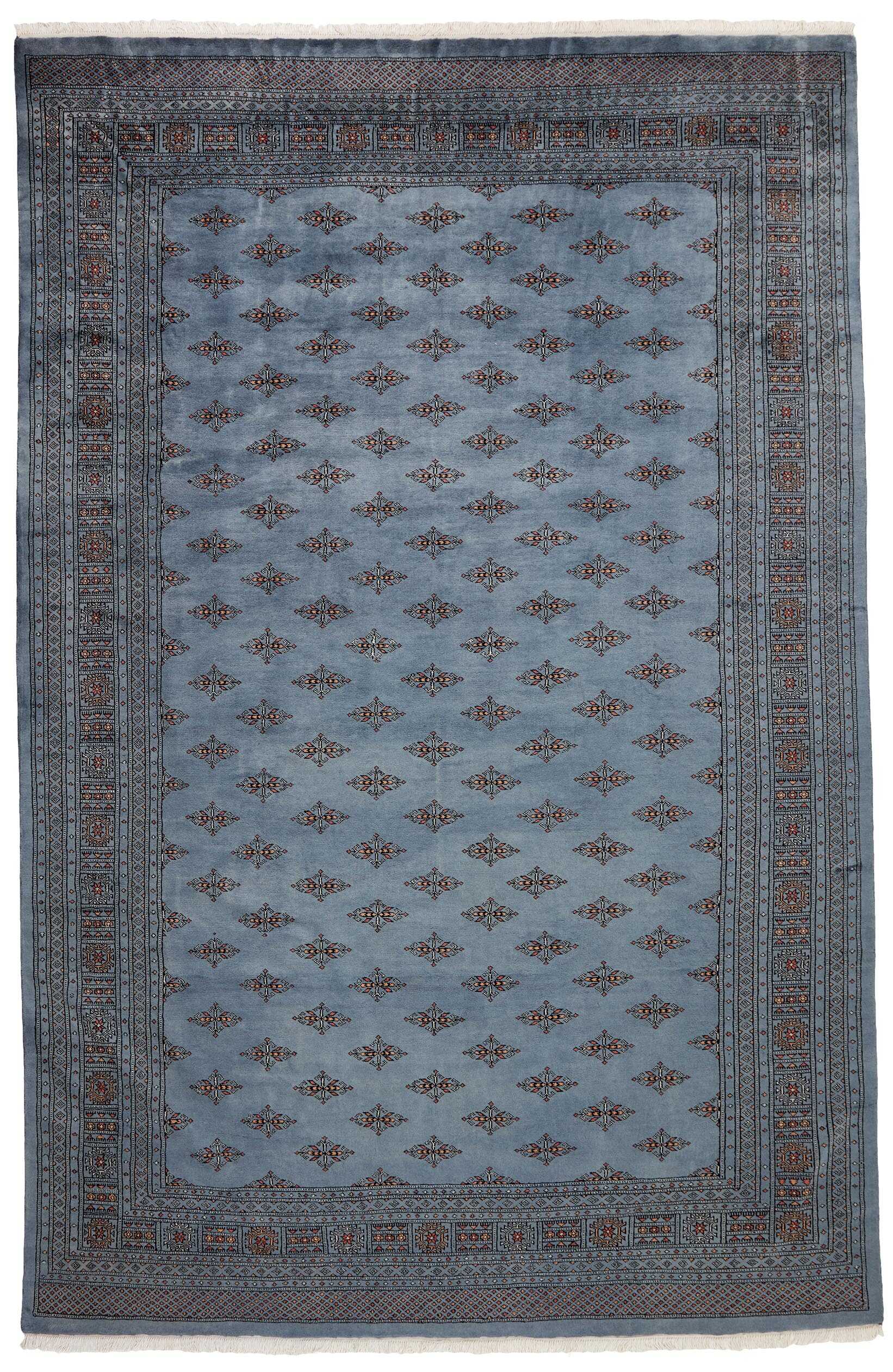 blue oriental rug with traditional pattern