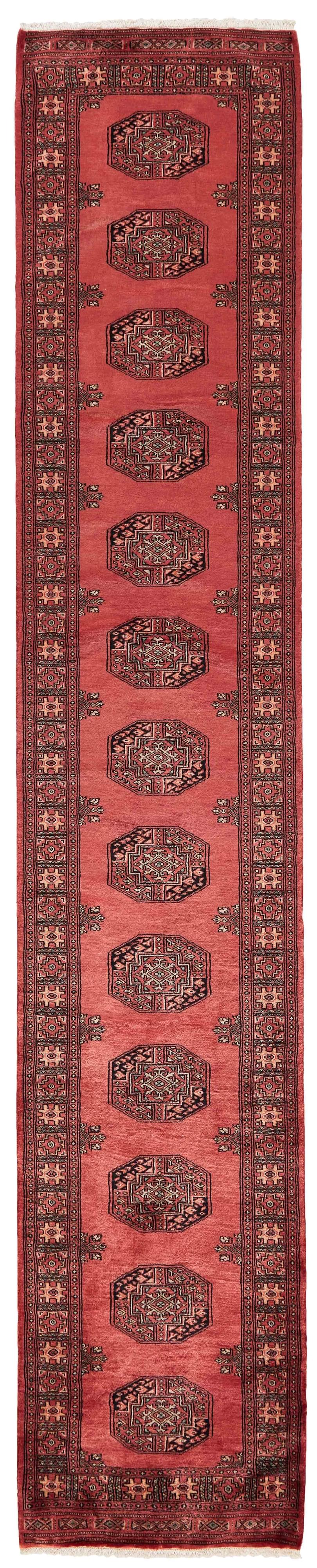 red oriental runner with traditional gul pattern