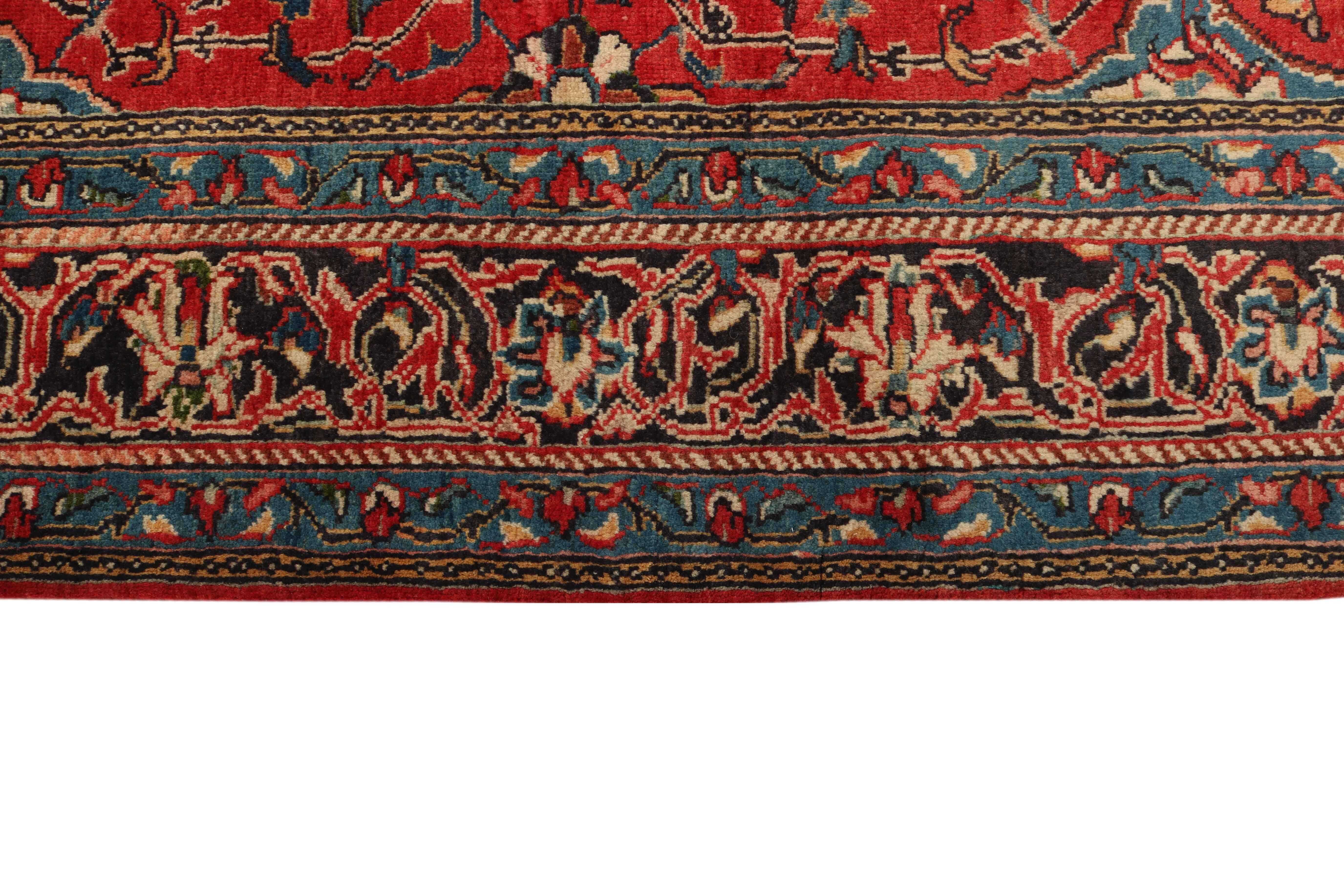 Large authentic persian rug with traditional floral pattern in red