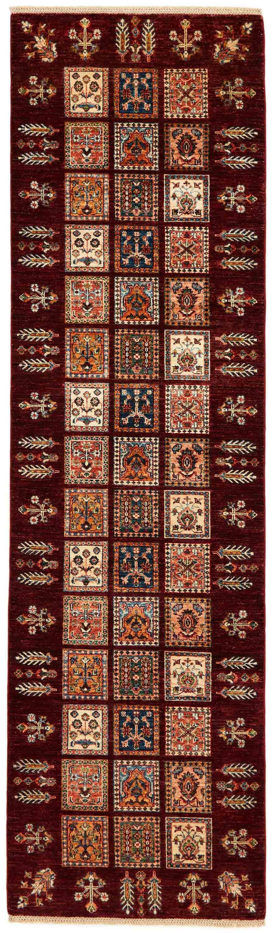 Authentic oriental runner with traditional pattern in red, orange, yellow, blue, green, beige and brown