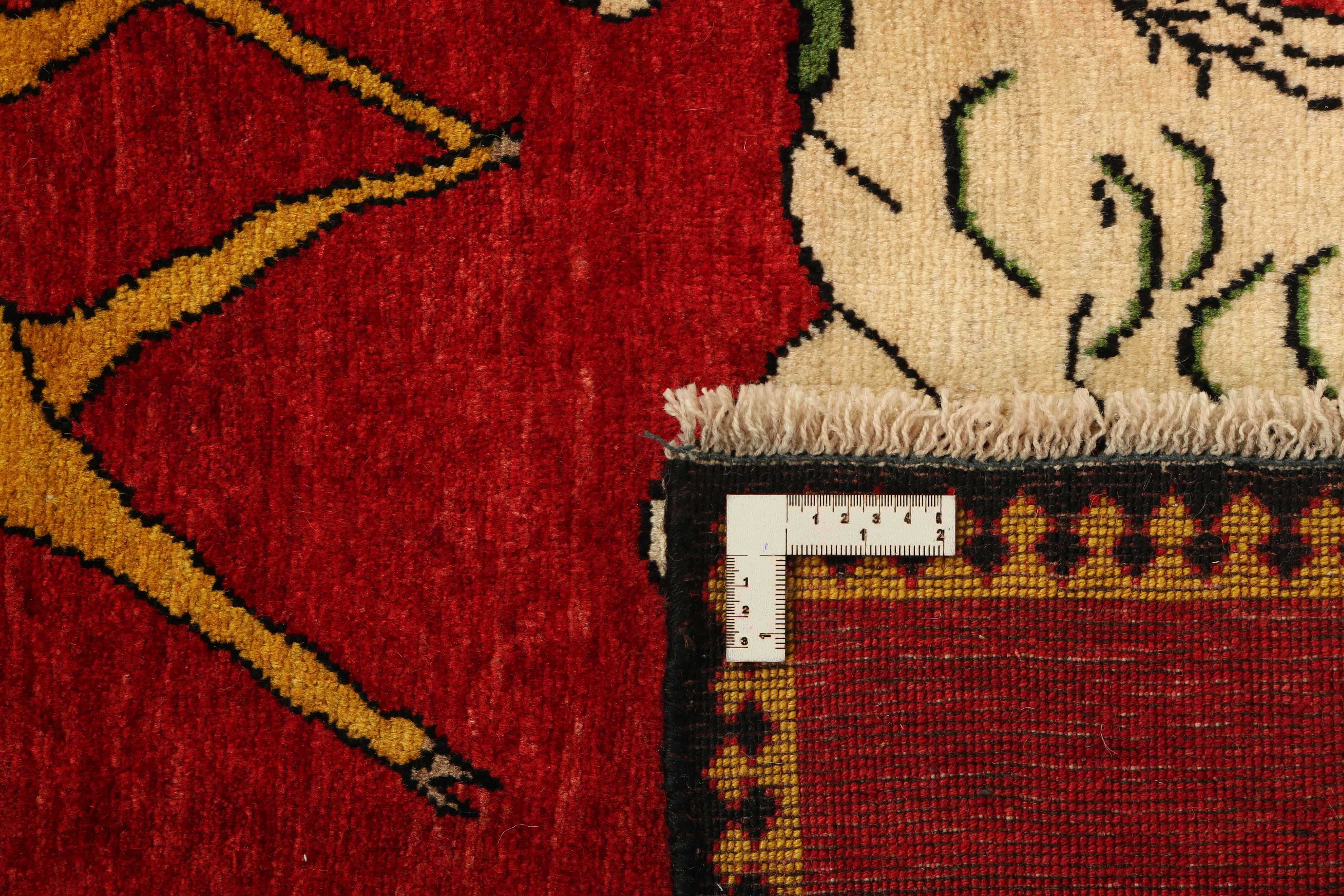 red persian rug with figural design