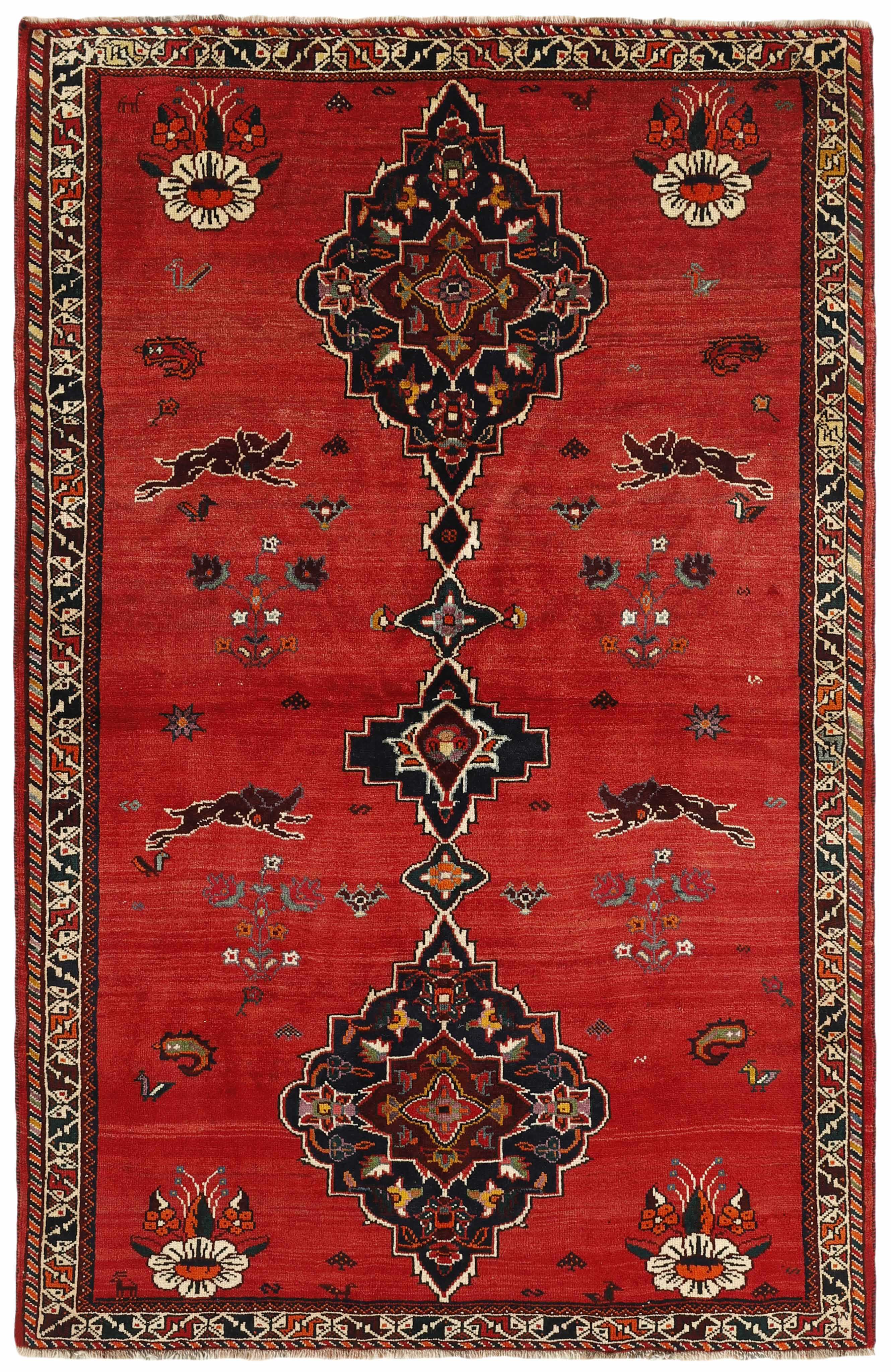 Authentic persian rug with a traditional tribal geometric pattern in red, black and beige