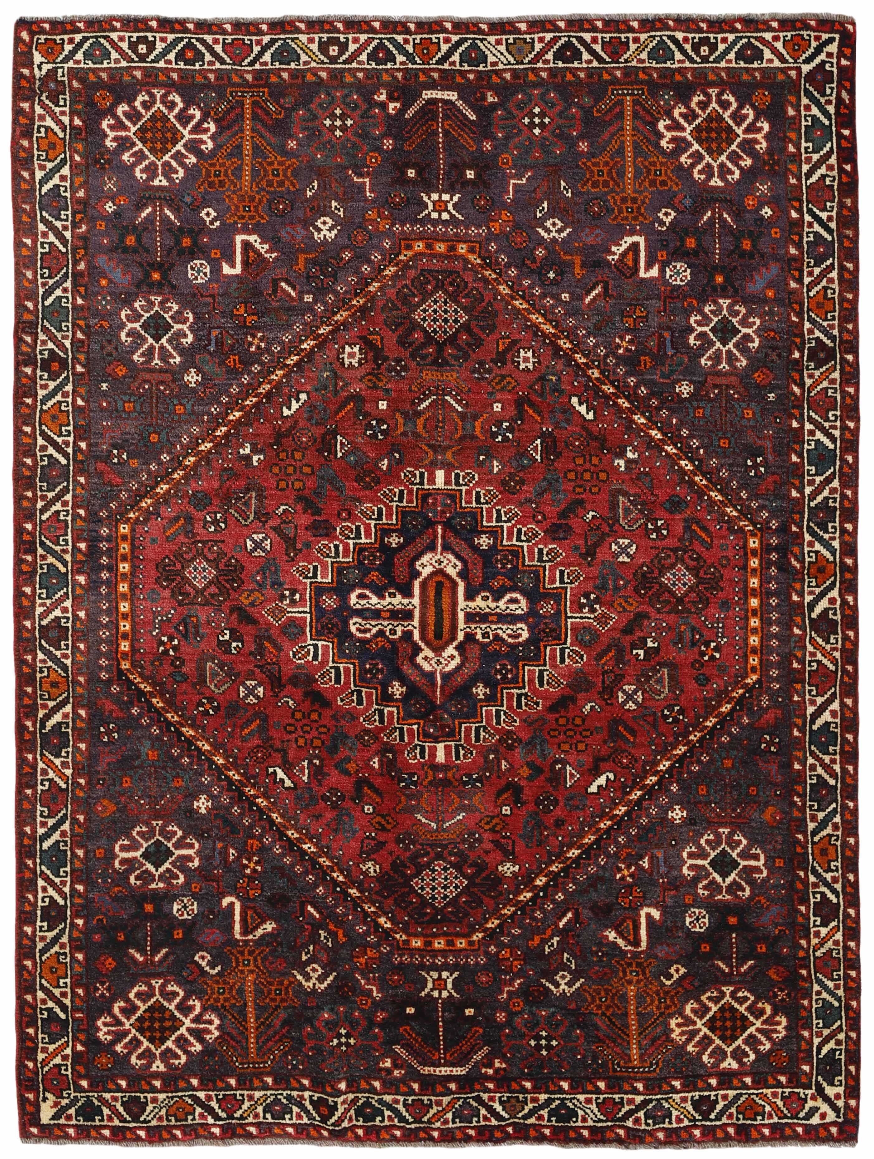 Authentic persian rug with a traditional tribal geometric pattern in red, black and beige