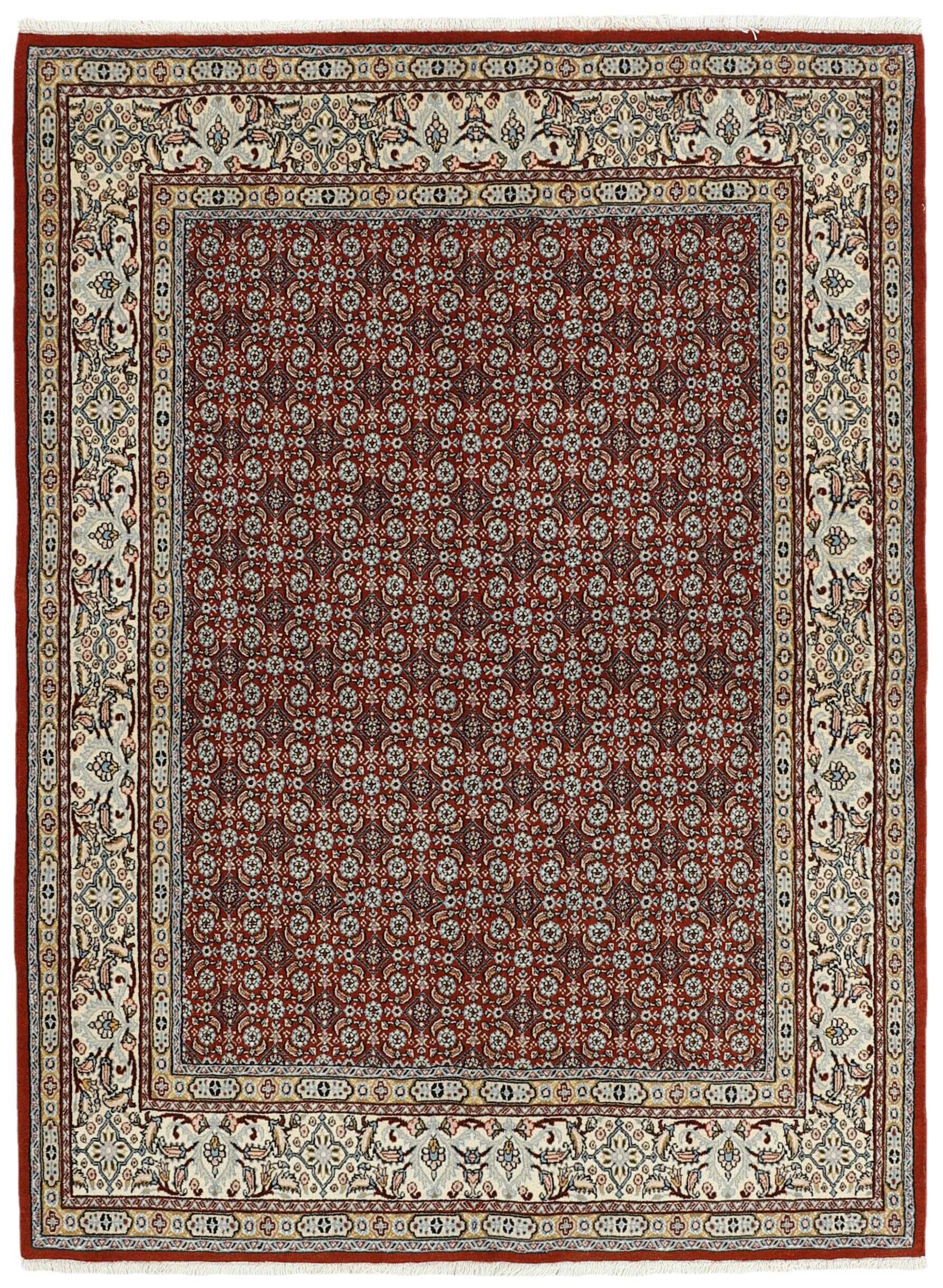 authentic persian rug with traditional floral pattern in red, blue and beige