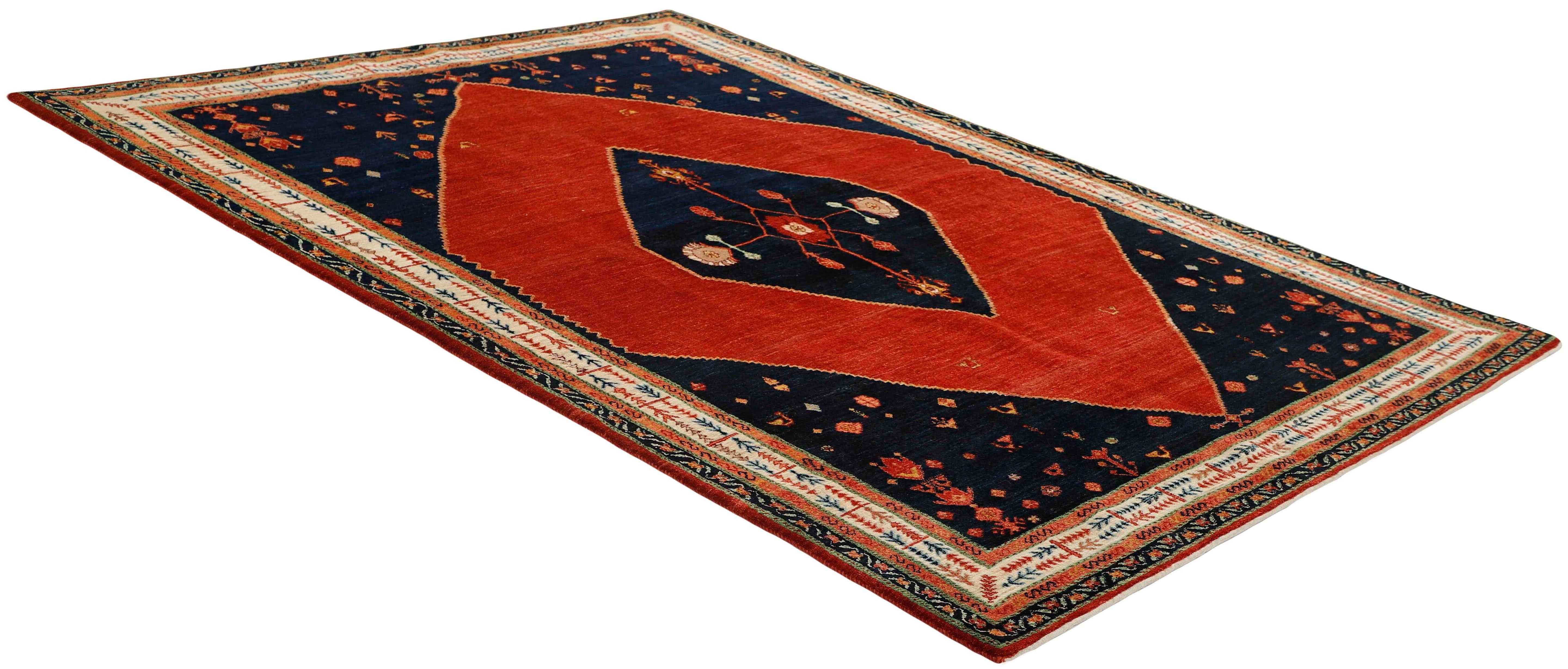 red Persian rug with tribal geometric design