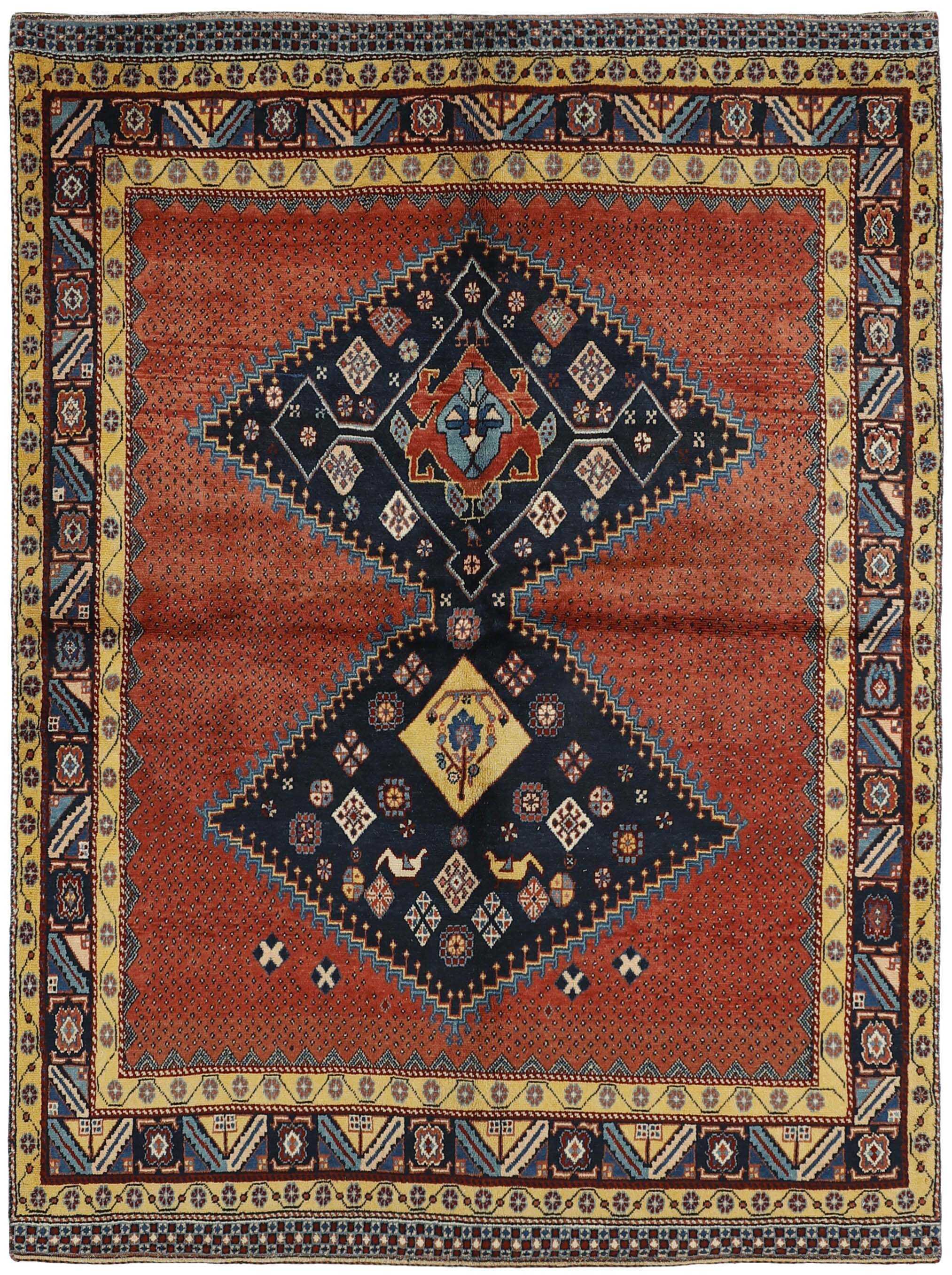 blue Persian rug with tribal geometric design