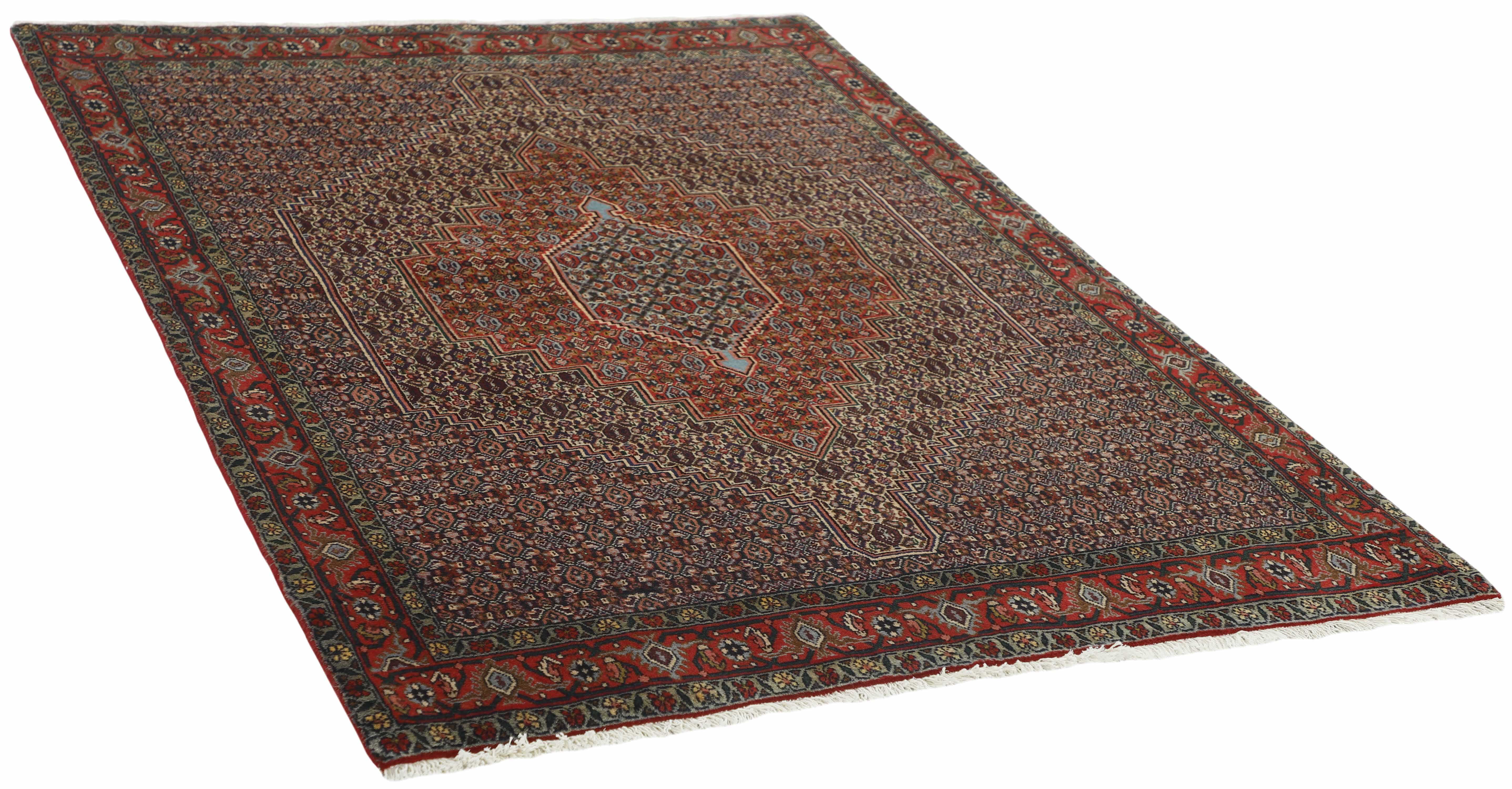 authentic persian rug with a traditional geometric design in red