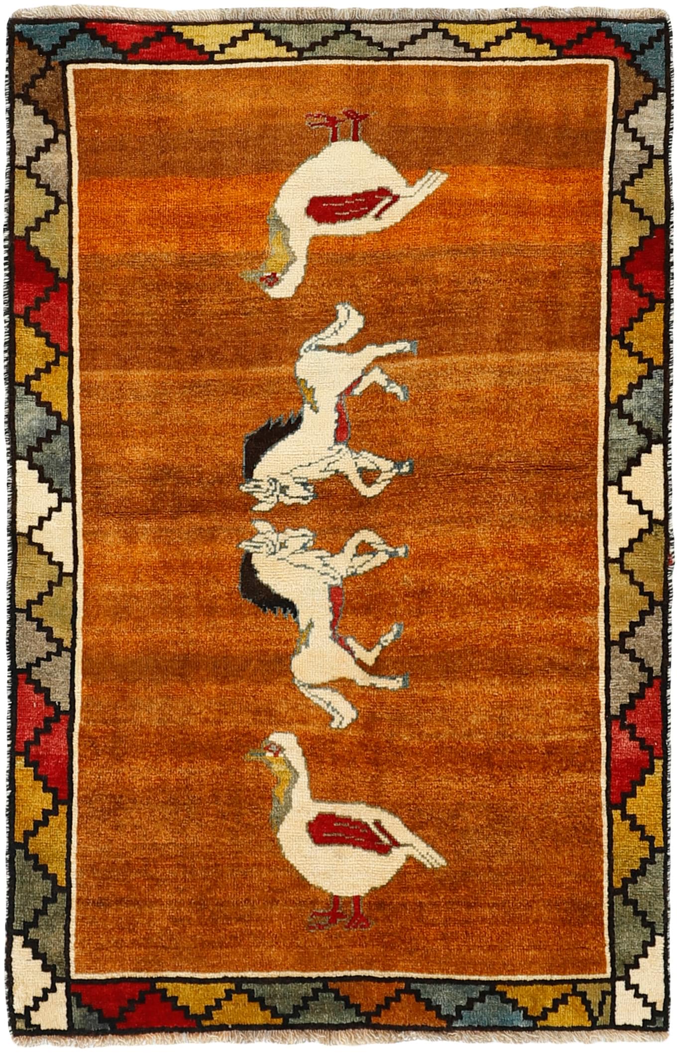orange persian rug with figural design