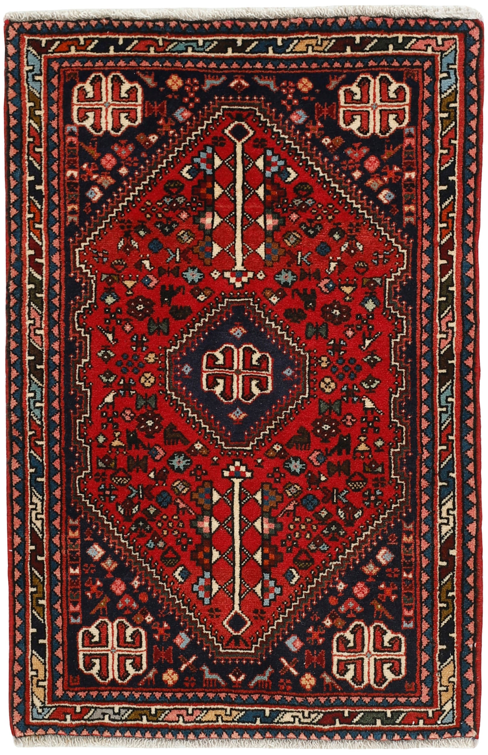 Authentic persian rug with traditional tribal geometric design in red