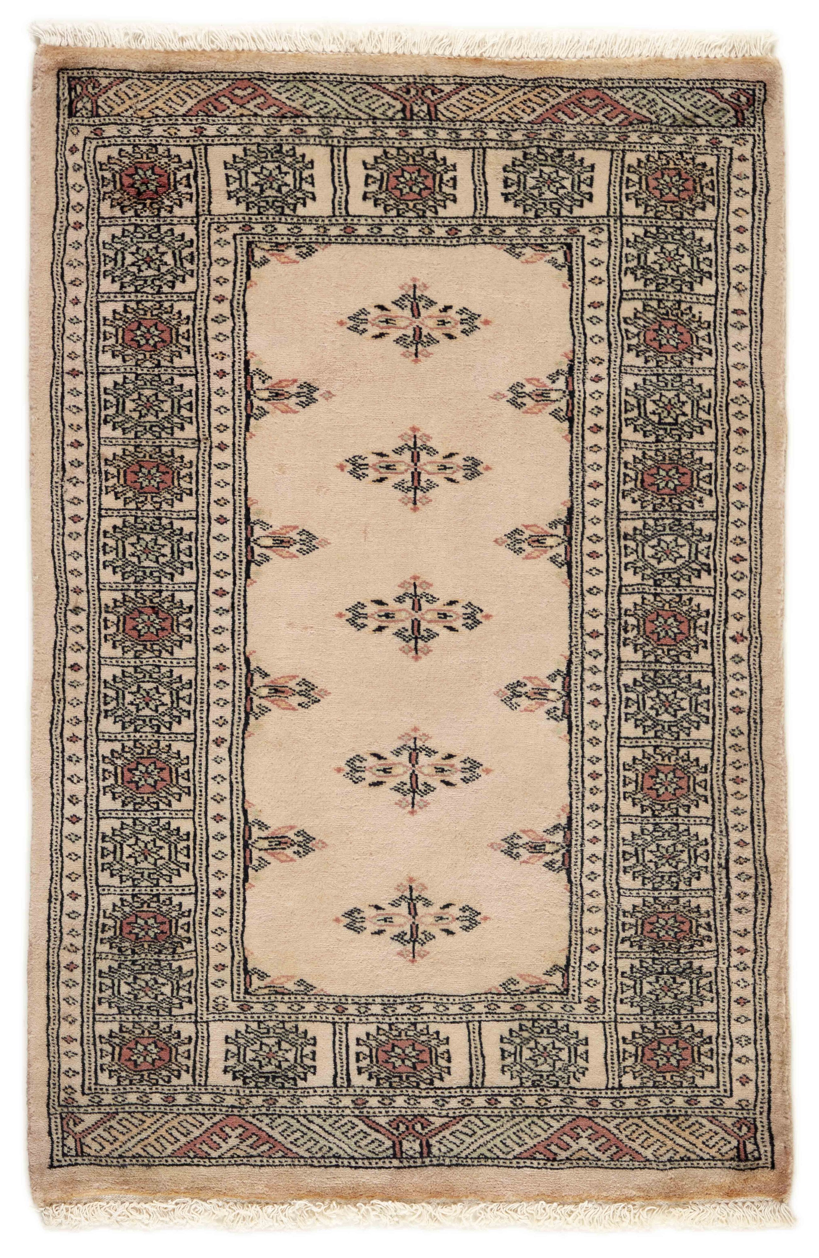 Beige Oriental rug with traditional bordered pattern