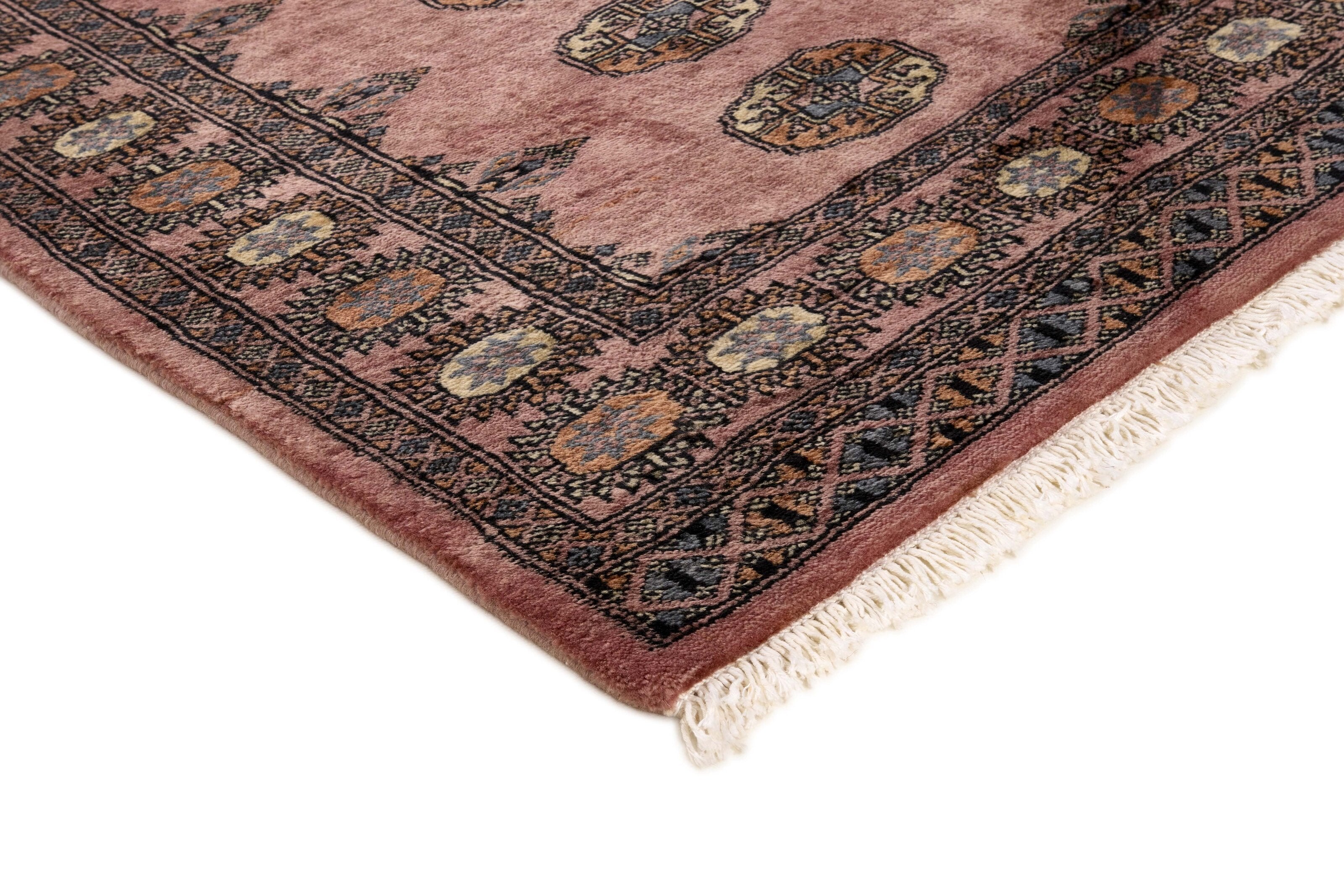 Red Oriental rug with traditional bordered pattern