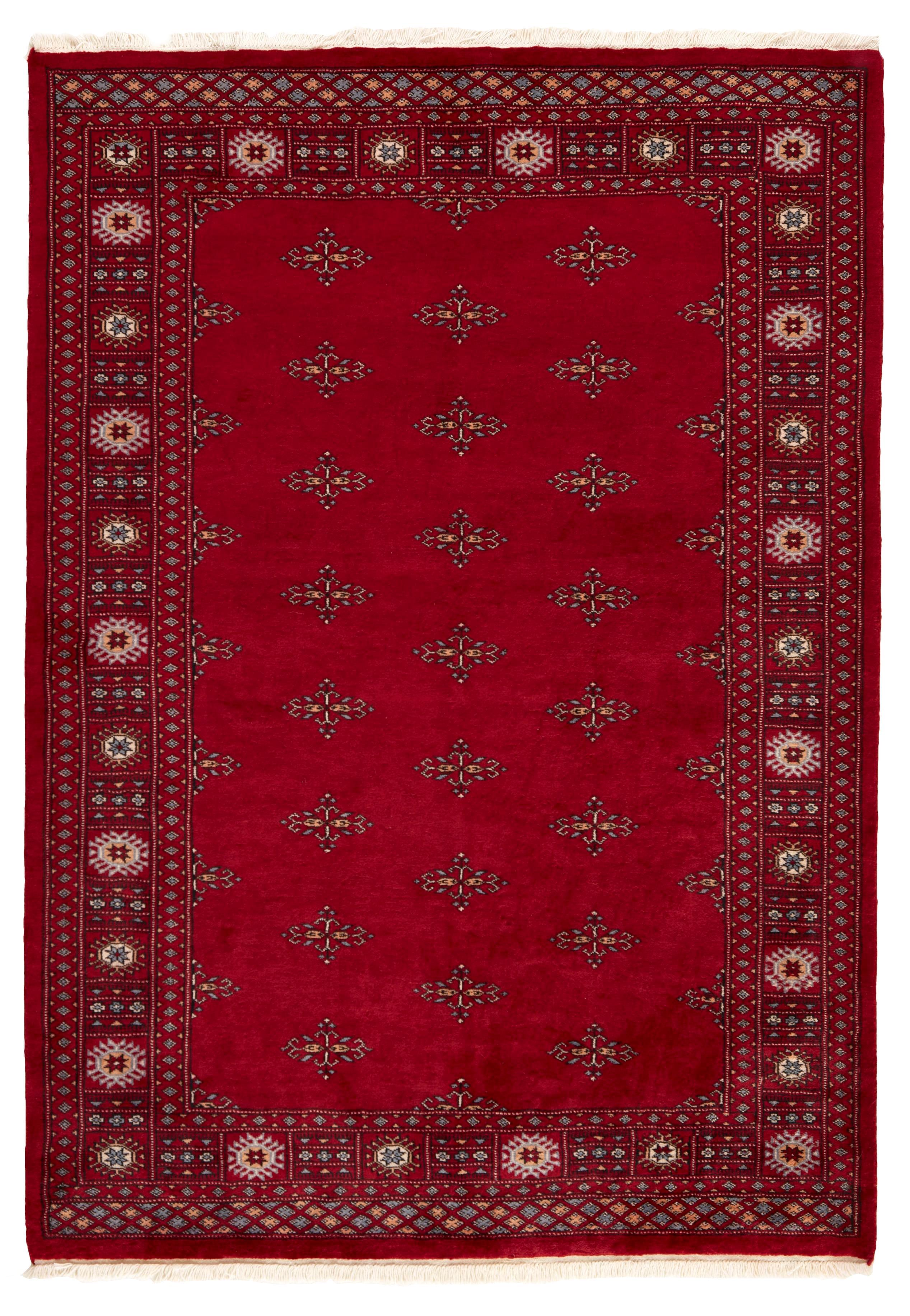 red oriental rug with traditional pattern