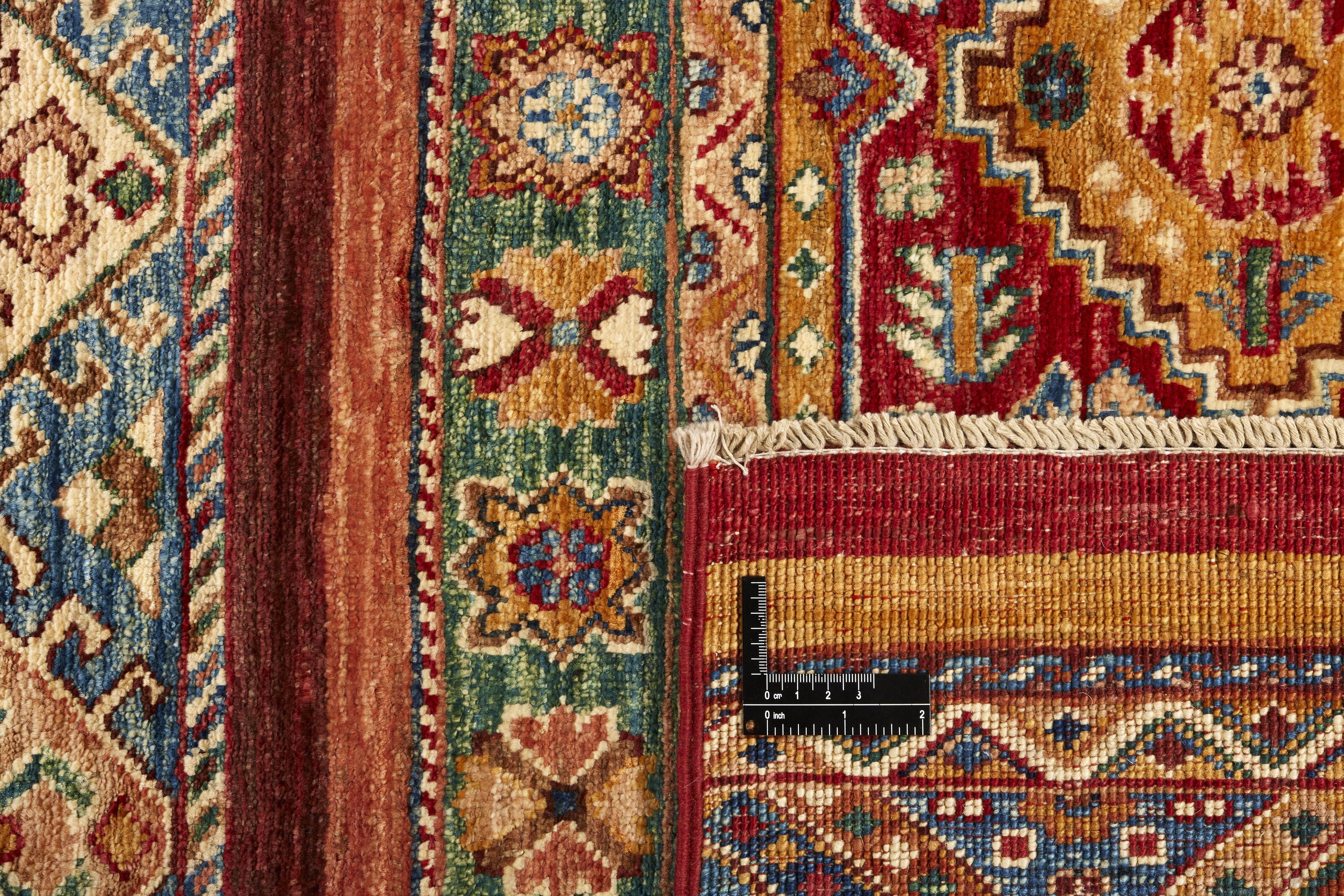 Authentic multicolour shall rug with traditional pattern