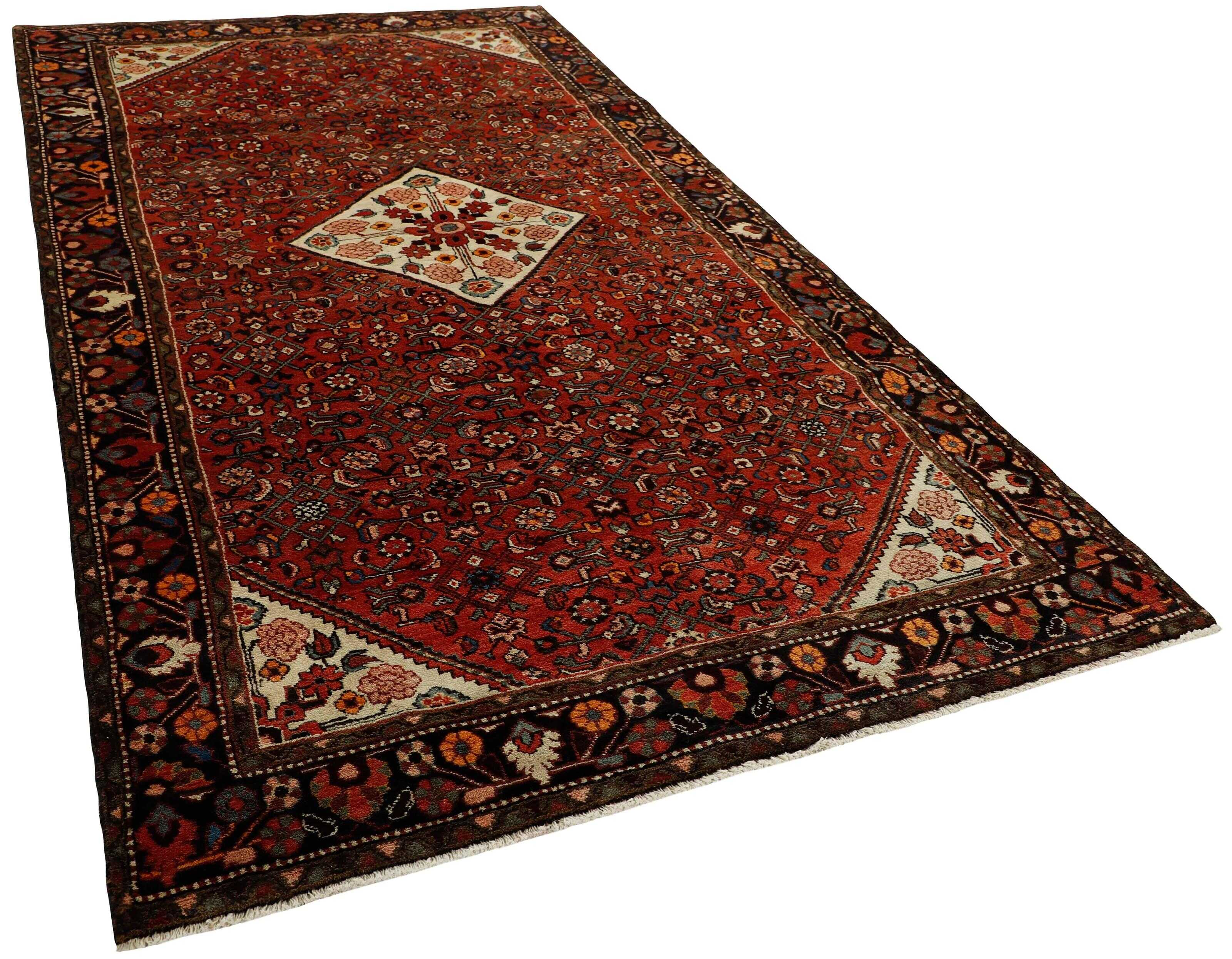 Red and black traditional persian rug with floral design