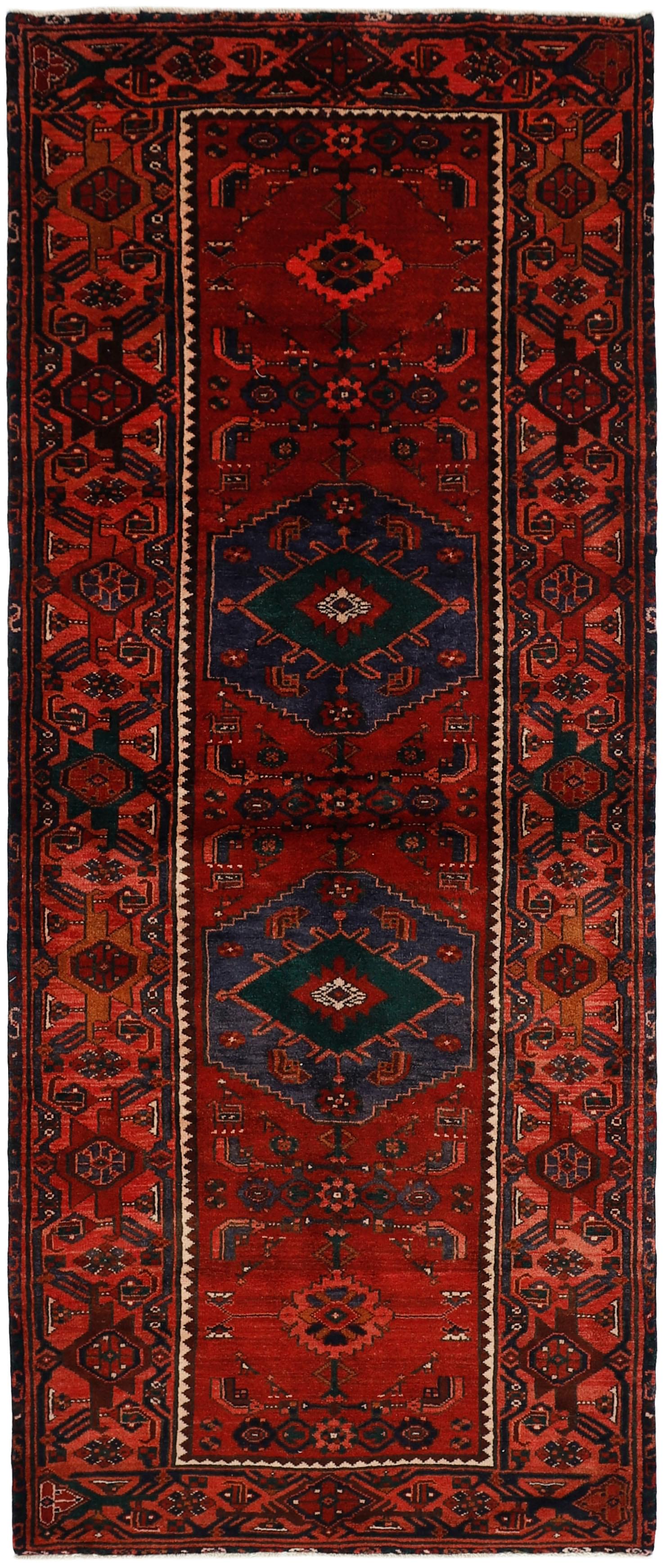 Authentic persian rug with stylised geometric design in red