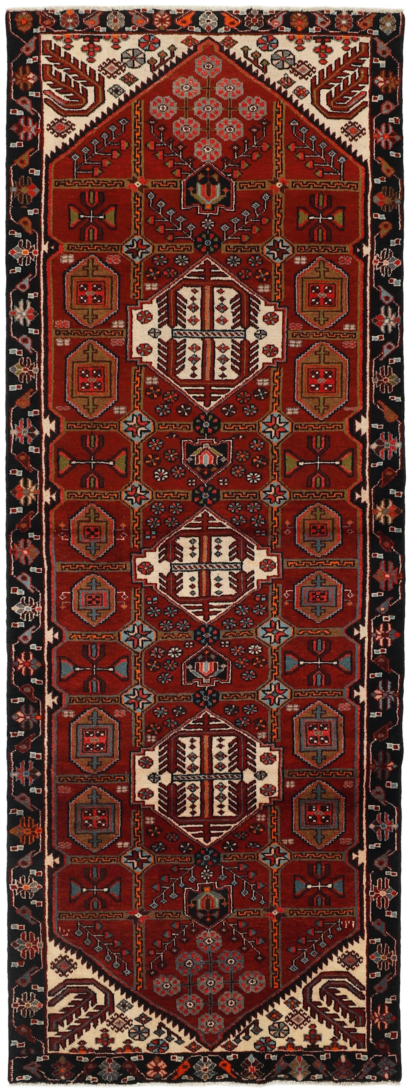 Authentic persian rug with tribal geometric design in red and black