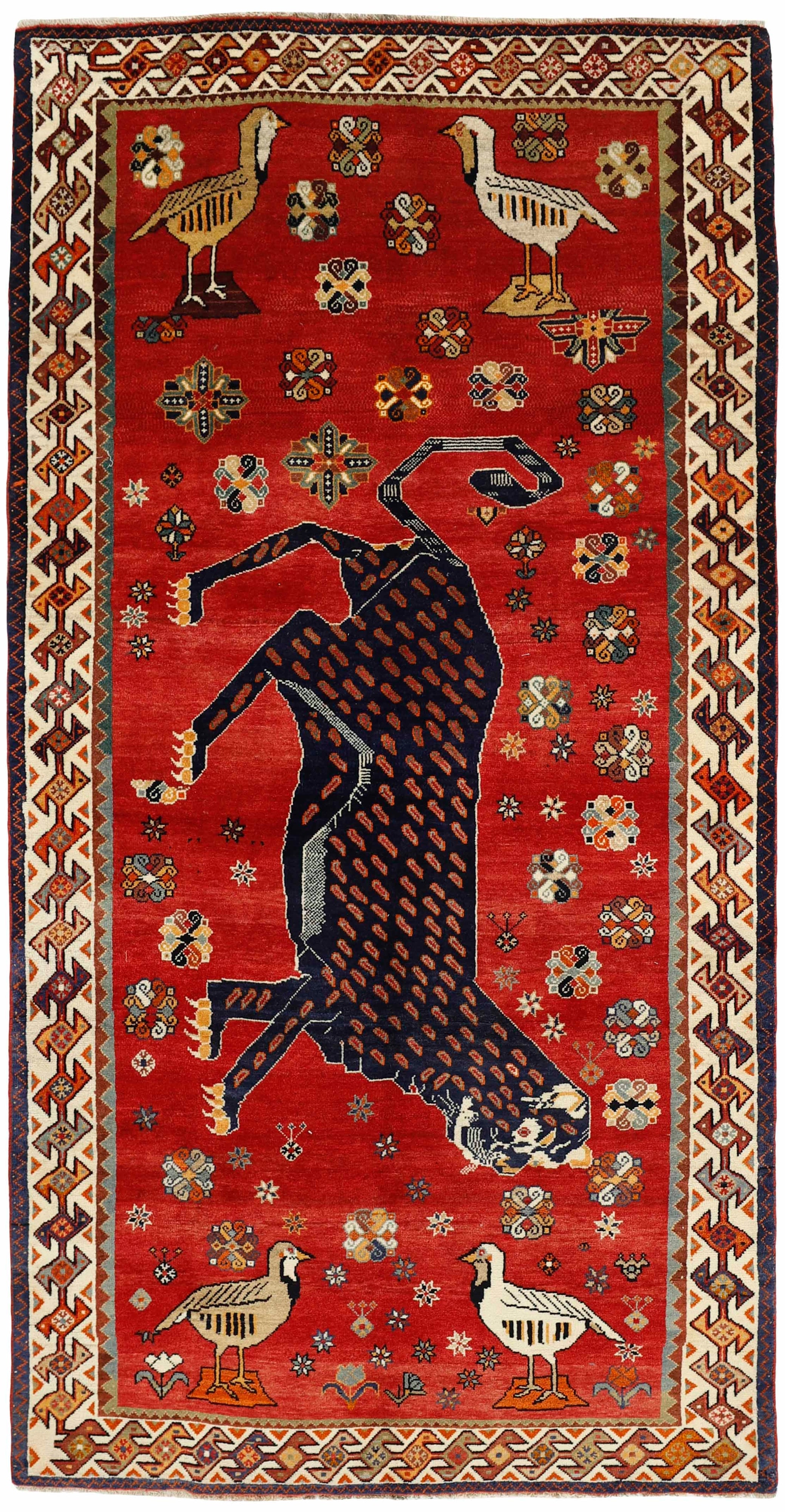 red persian rug with figural design