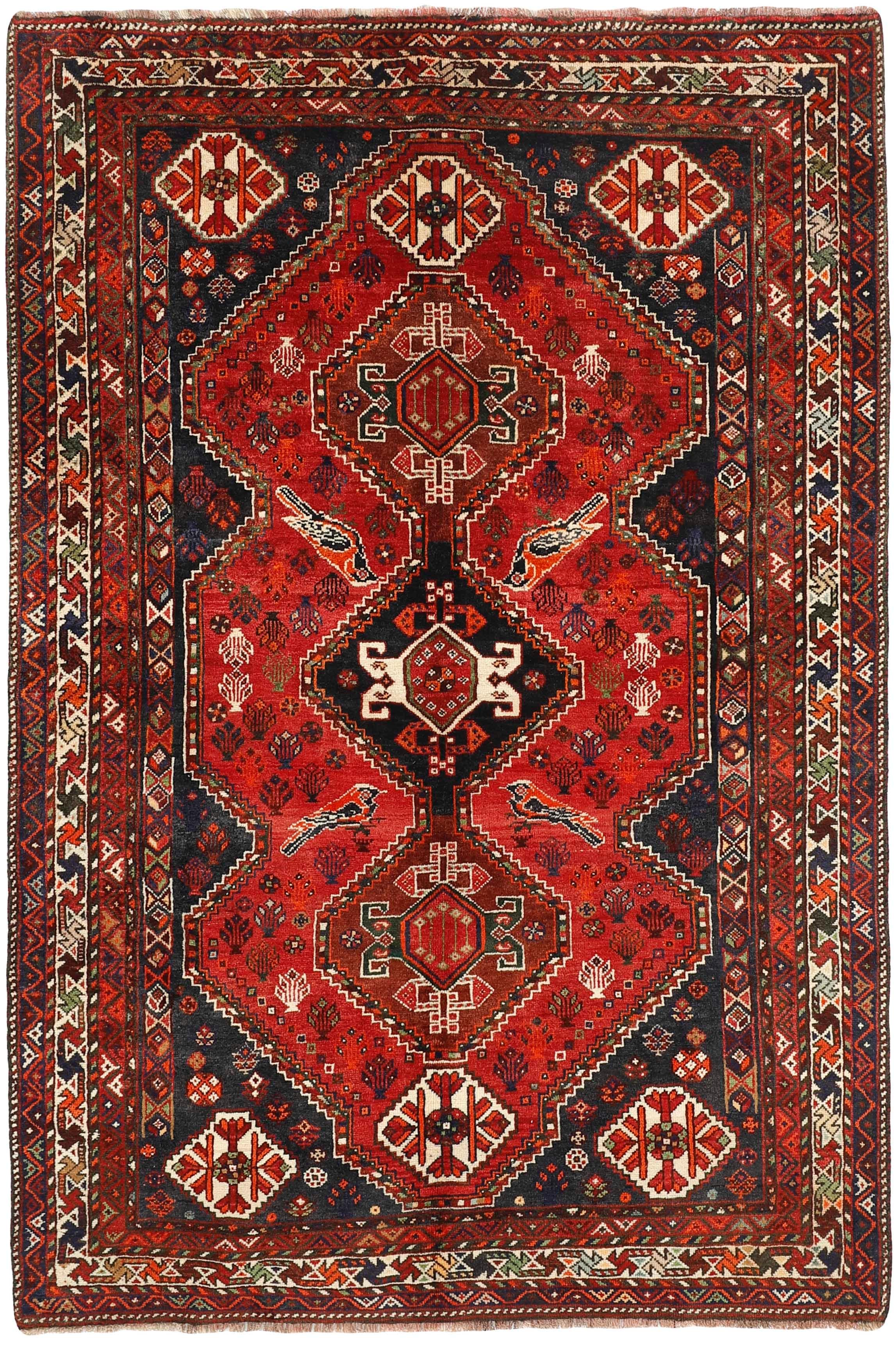 red and black persian rug with geometric design