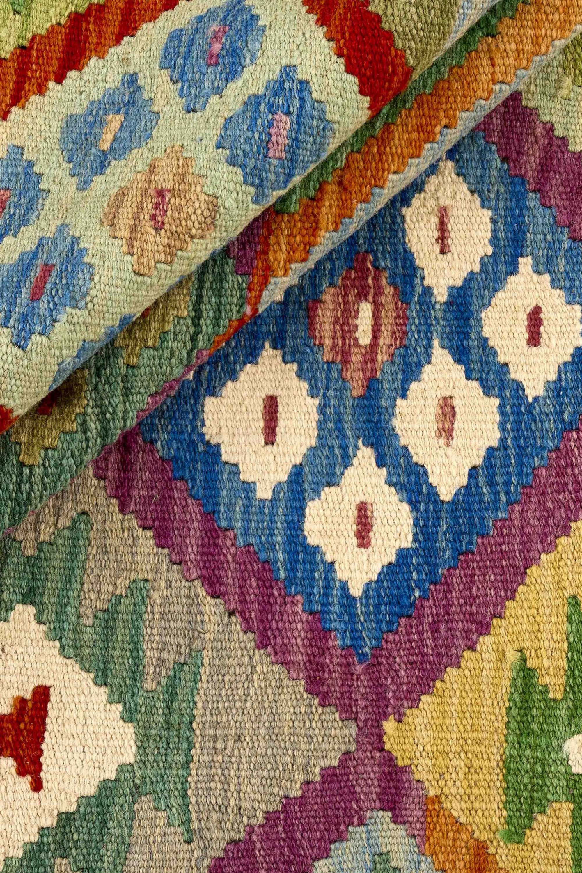 Authentic Persian Kilim flatweave rug with traditional multicolour pattern