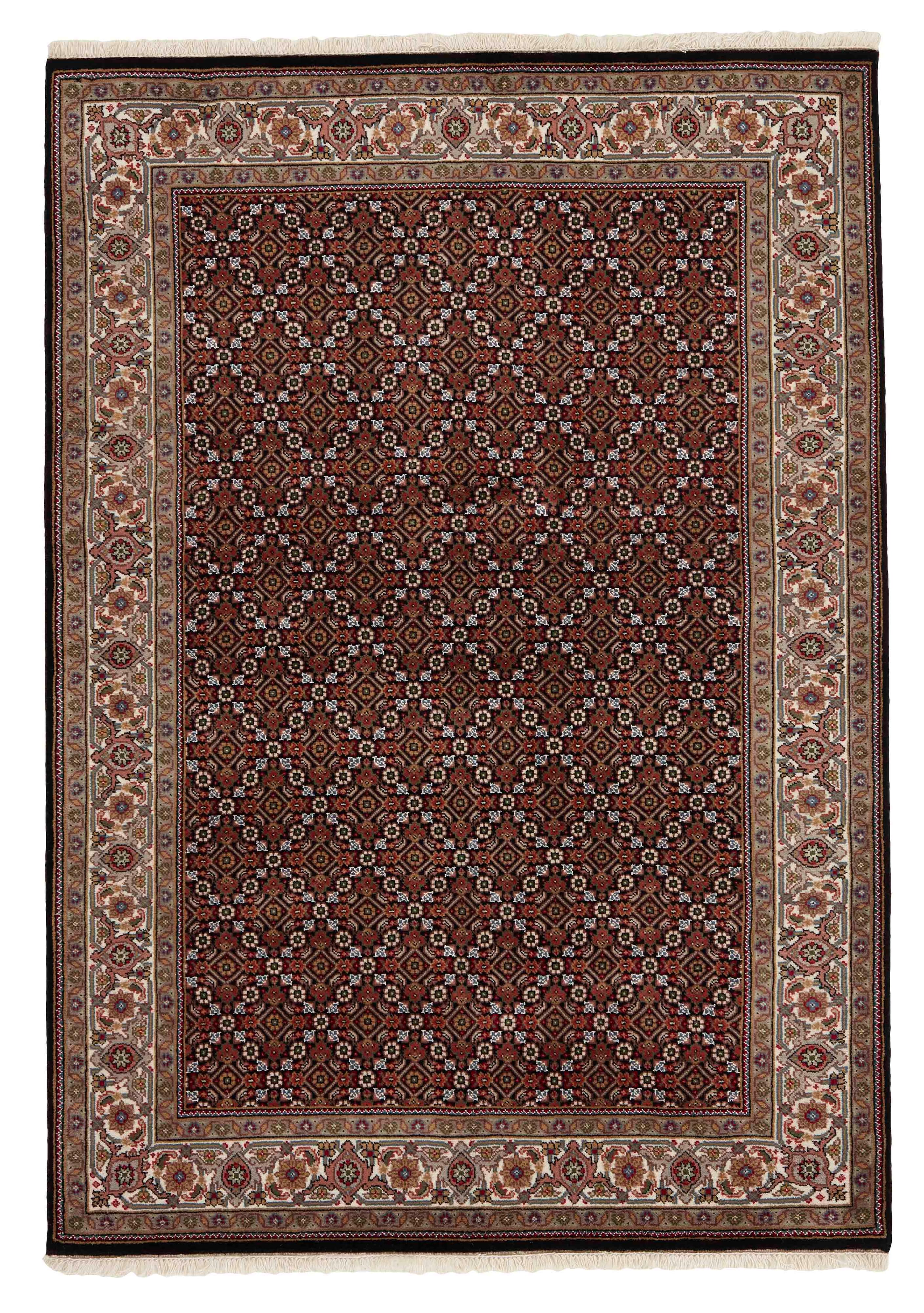 Authentic Oriental rug with traditional geometric and floral design in beige, blue, green and black