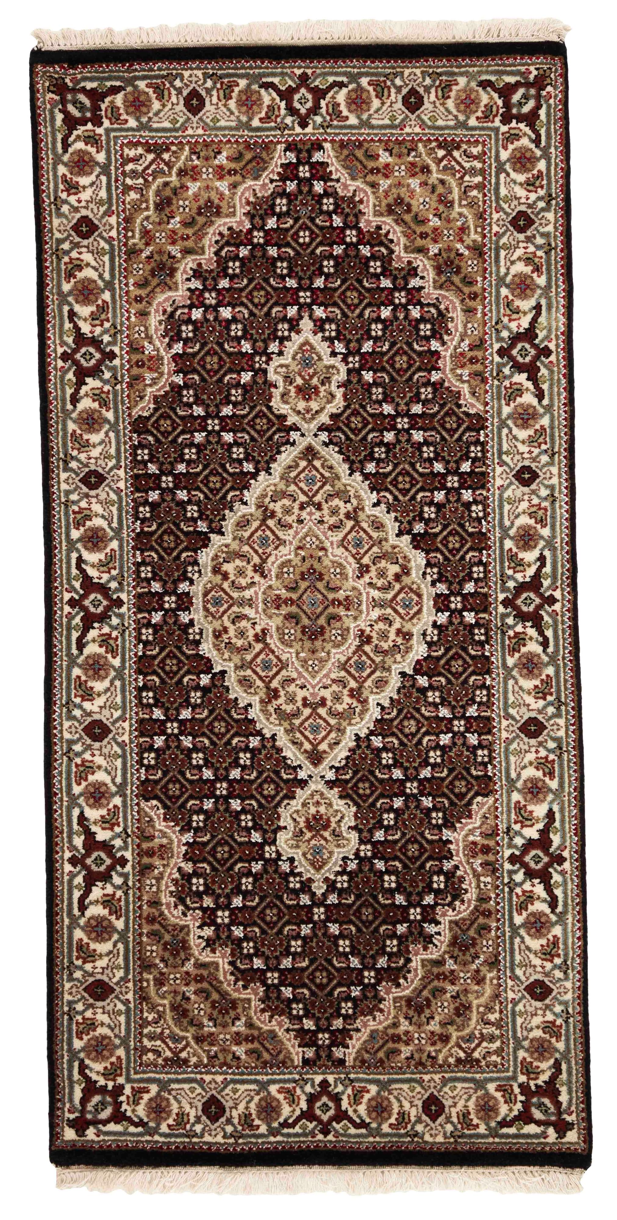 Authentic Oriental rug with traditional geometric and floral design in beige, blue, green and black