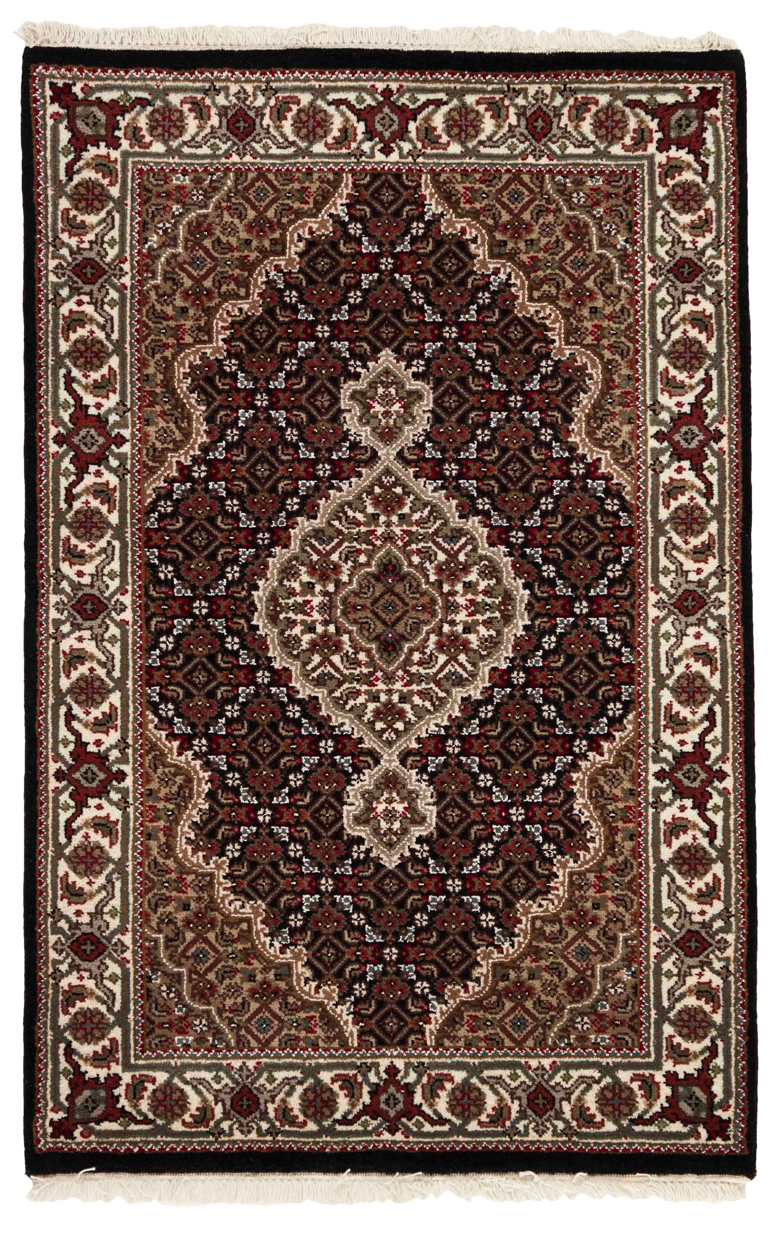 Authentic Oriental rug with traditional geometric and floral design in beige, blue, green and black