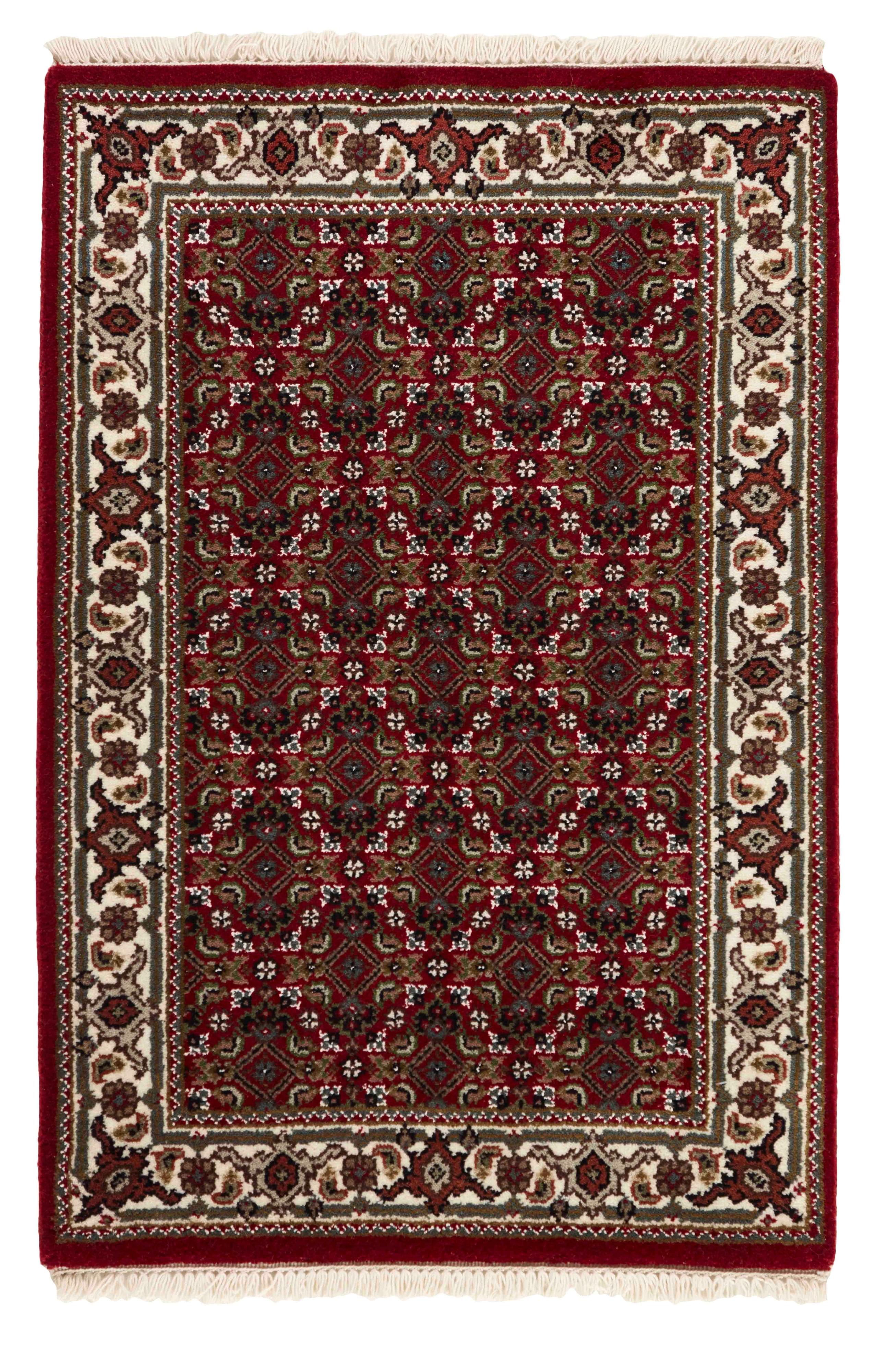 Authentic Oriental rug with traditional geometric and floral design in beige, blue, green and black