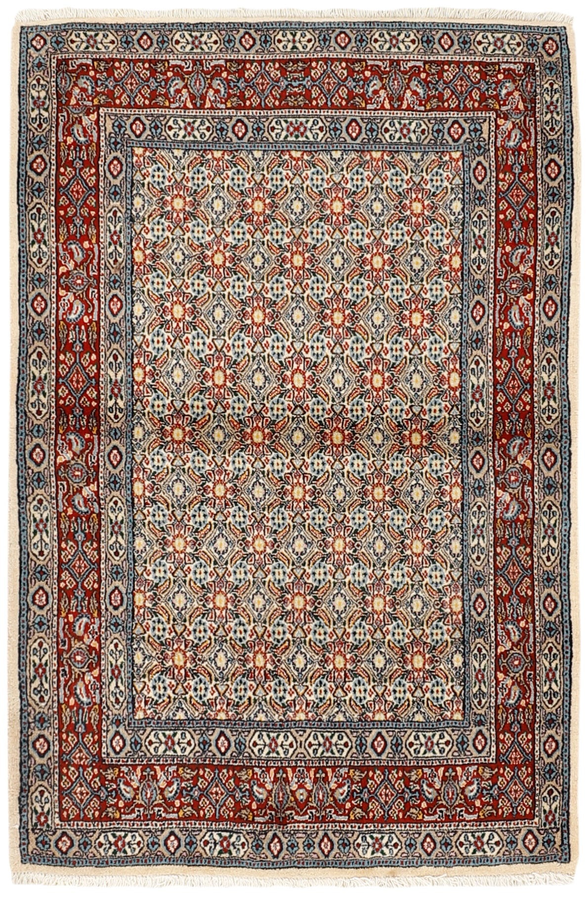 authentic persian rug with traditional floral pattern in cream, blue and red