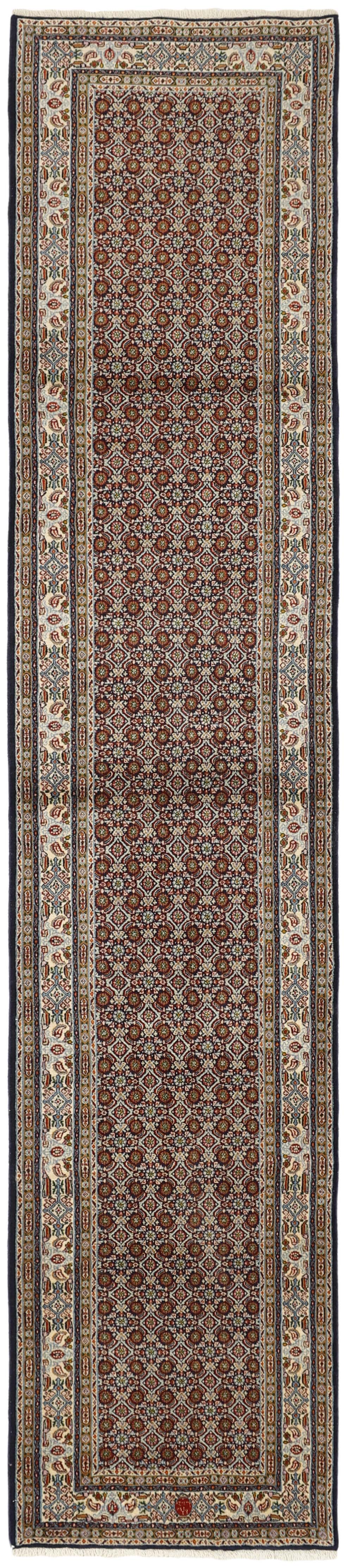 authentic persian runner with traditional floral pattern in cream, blue and red